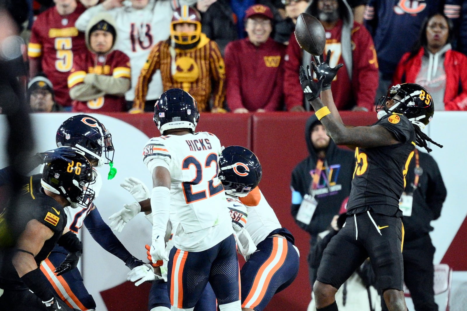 FILE - Washington Commanders wide receiver Noah Brown (85) catches a 52-yard touchdown pass in the end zone as time expires to give the Commanders an 18-15 win over the Chicago Bears in an NFL football game Sunday, Oct. 27, 2024, in Landover, Md. (AP Photo/Nick Wass, File)