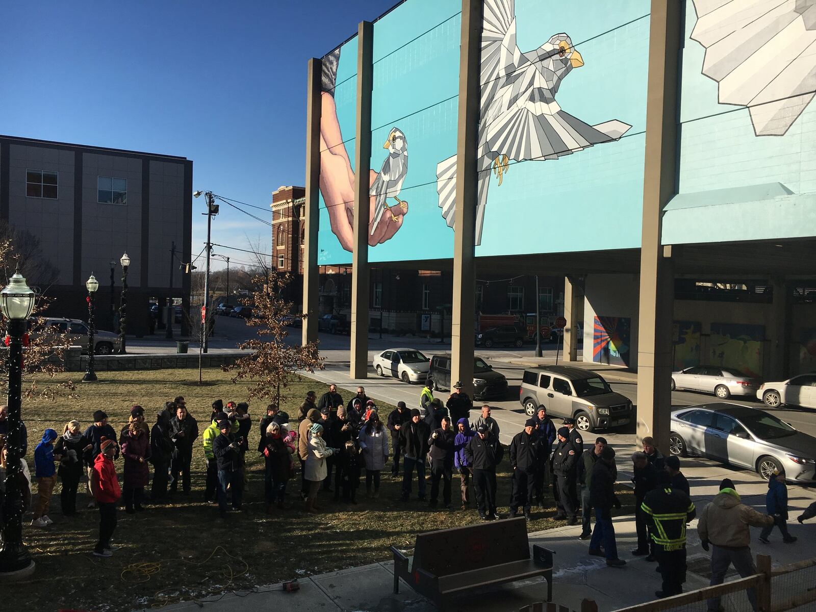 A large crowd braved frigid temperatures to show up for the bench dedication and gave a collective loud round of applause as the festive metal bench, featuring a tribute to Wolterman and his last alarm information.