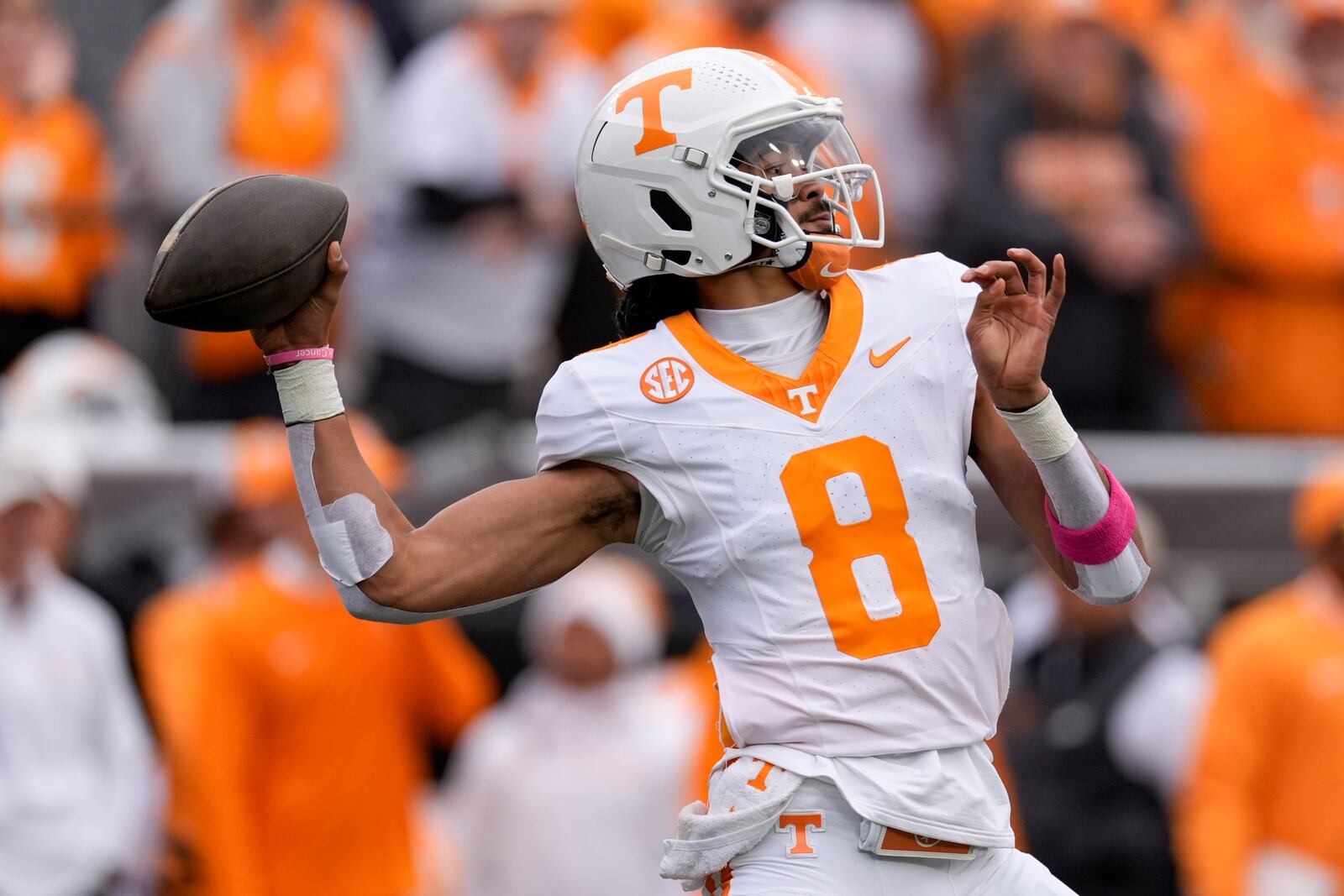 Tennessee quarterback Nico Iamaleava (8) looks to throw a pass during the first half of an NCAA college football game against Vanderbilt, Saturday, Nov. 30, 2024, in Nashville, Tenn. (AP Photo/George Walker IV)