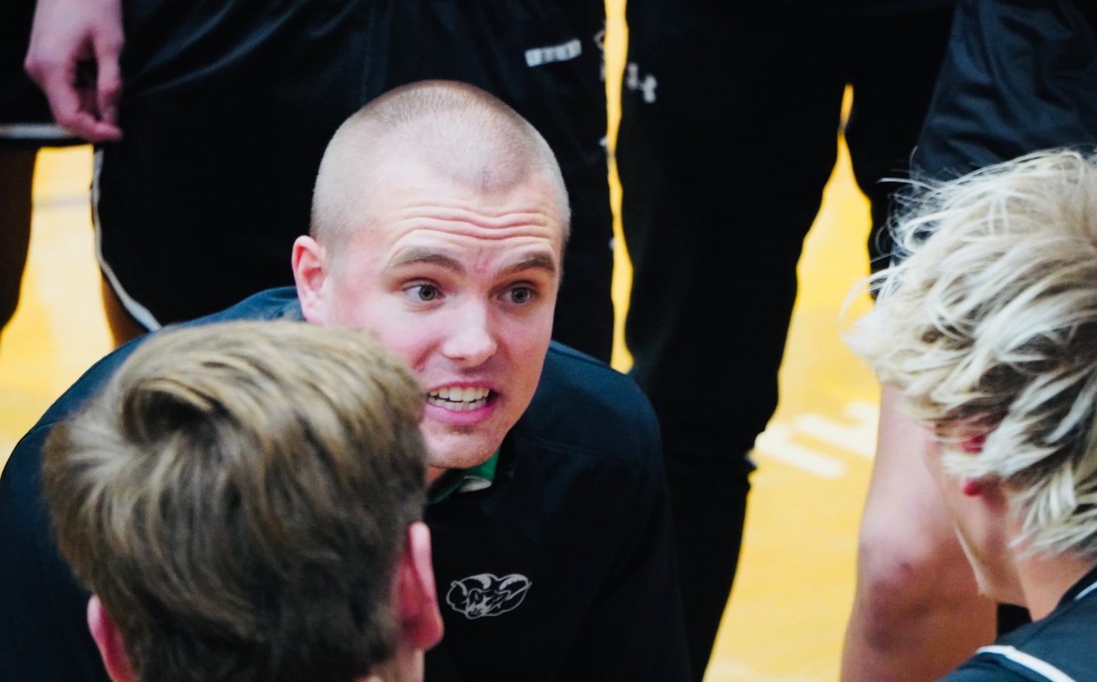 Badin coach CJ Fleming talks to his players during a timeout against Edgewood on Friday. Chris Vogt/CONTRIBUTED