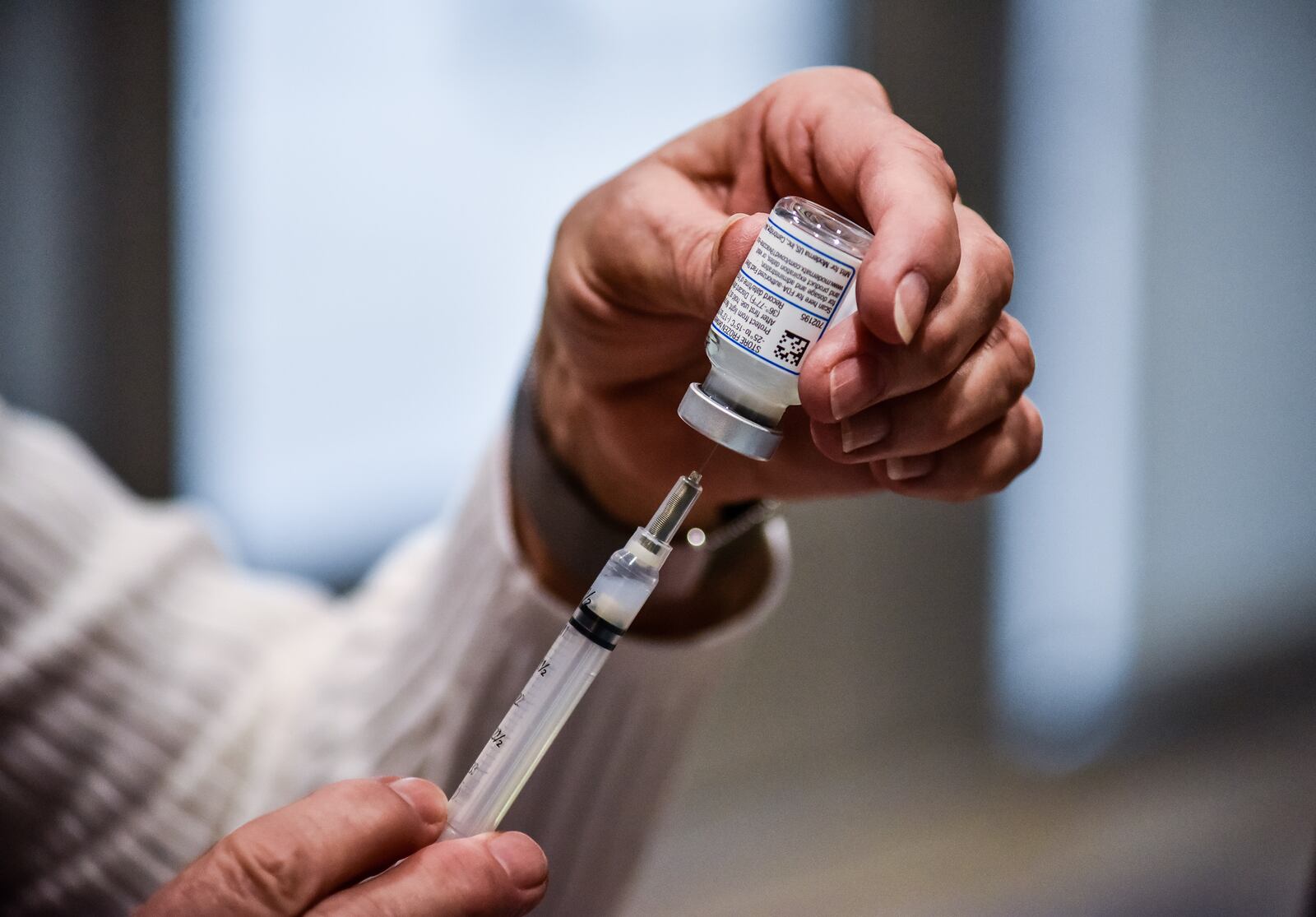 Middletown City Schools employees were some of the first teachers in Ohio to receive their Covid-19 vaccines Wednesday, January 27, 2021 at Middletown High School. NICK GRAHAM / STAFF