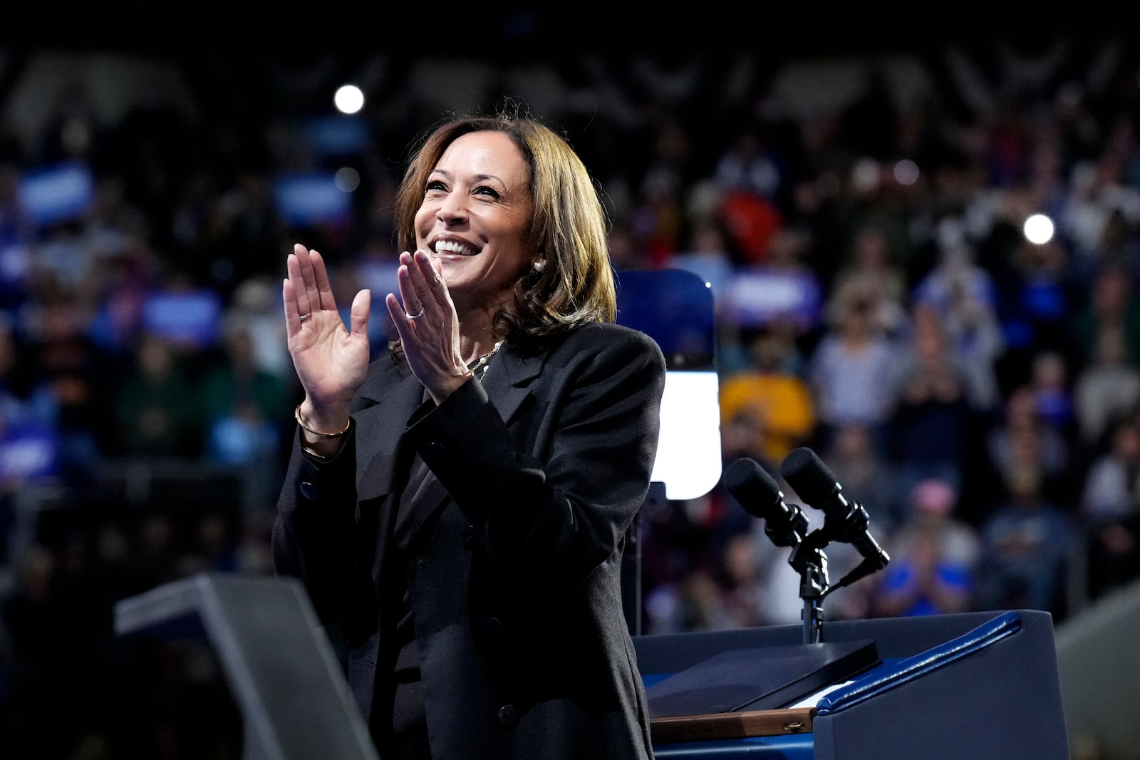 Democratic presidential nominee Vice President Kamala Harris claps on stage during a campaign rally at Erie Insurance Arena, in Erie, Pa., Monday, Oct. 14, 2024. (AP Photo/Jacquelyn Martin)