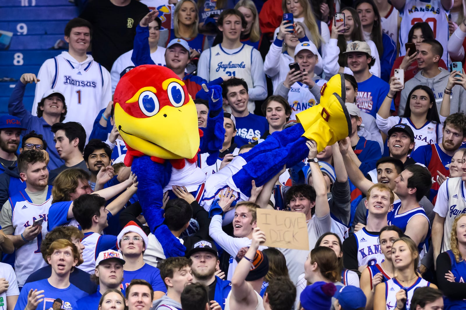 FILE - Kansas mascot Big Jay surfs the crowd during the second half of an NCAA college basketball game against Indiana in Lawrence, Kan., Saturday, Dec. 17, 2022. (AP Photo/Reed Hoffmann, File)