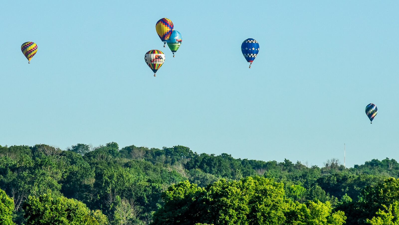 Competition balloons decorate the sky during the Ohio Challenge Hot Air Balloon Festival at Smith Park in Middletown in 2016. NICK GRAHAM/STAFF