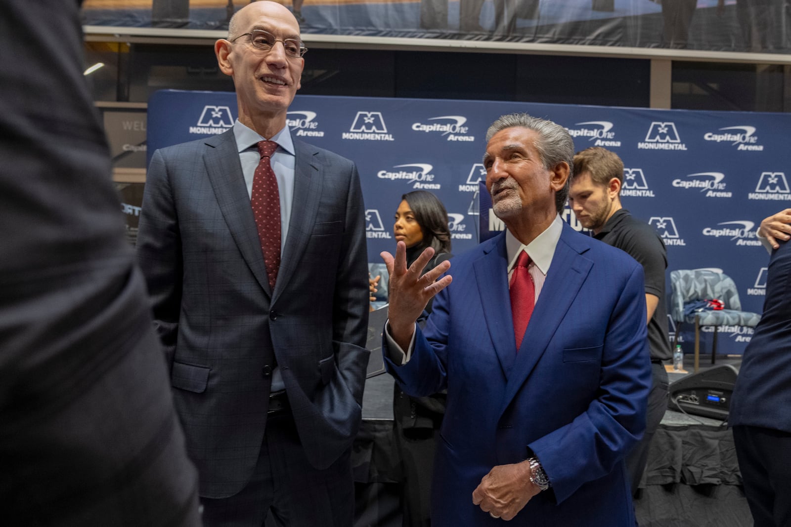 NBA Commissioner Adam Silver, left, and Ted Leonsis, owner of the Washington Wizards NBA basketball team and Washington Capitals NHL hockey team, attend an event announcing a new Capital One Arena Gallery Place Atrium, Thursday, Dec. 19, 2024, in Washington. (AP Photo/Jacquelyn Martin)