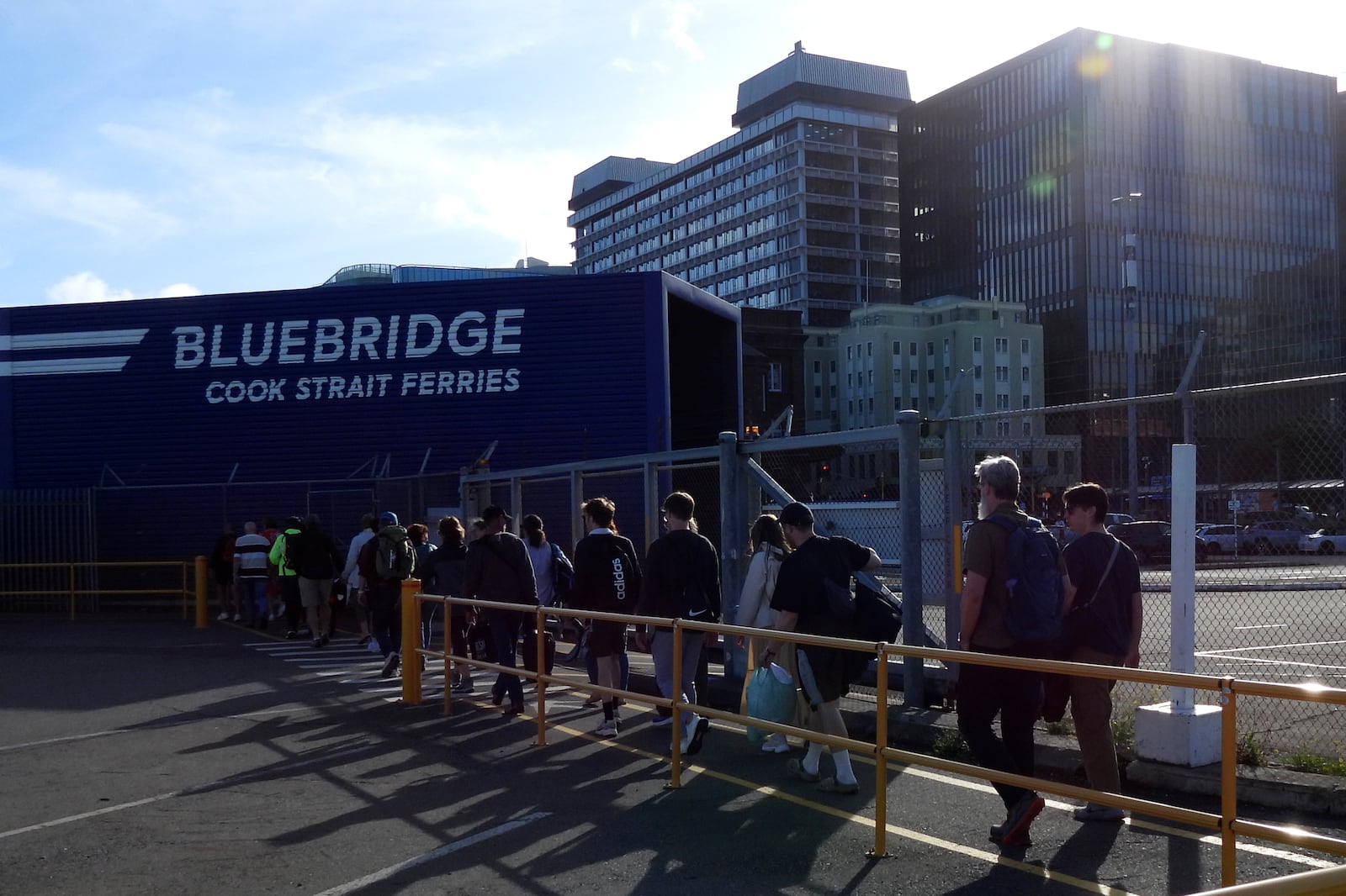 Bluebridge ferry passengers disembark in Wellington, New Zealand, on Tuesday, Jan. 7, 2025. (AP Photo/Charlotte Graham-McLay)