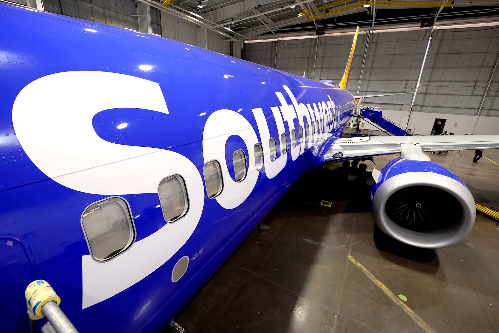 FILE - A retrofitted Southwest Airlines passenger jet is shown in a hangar at Love Field on Sept. 26, 2024, in Dallas. (AP Photo/Tony Gutierrez, File)