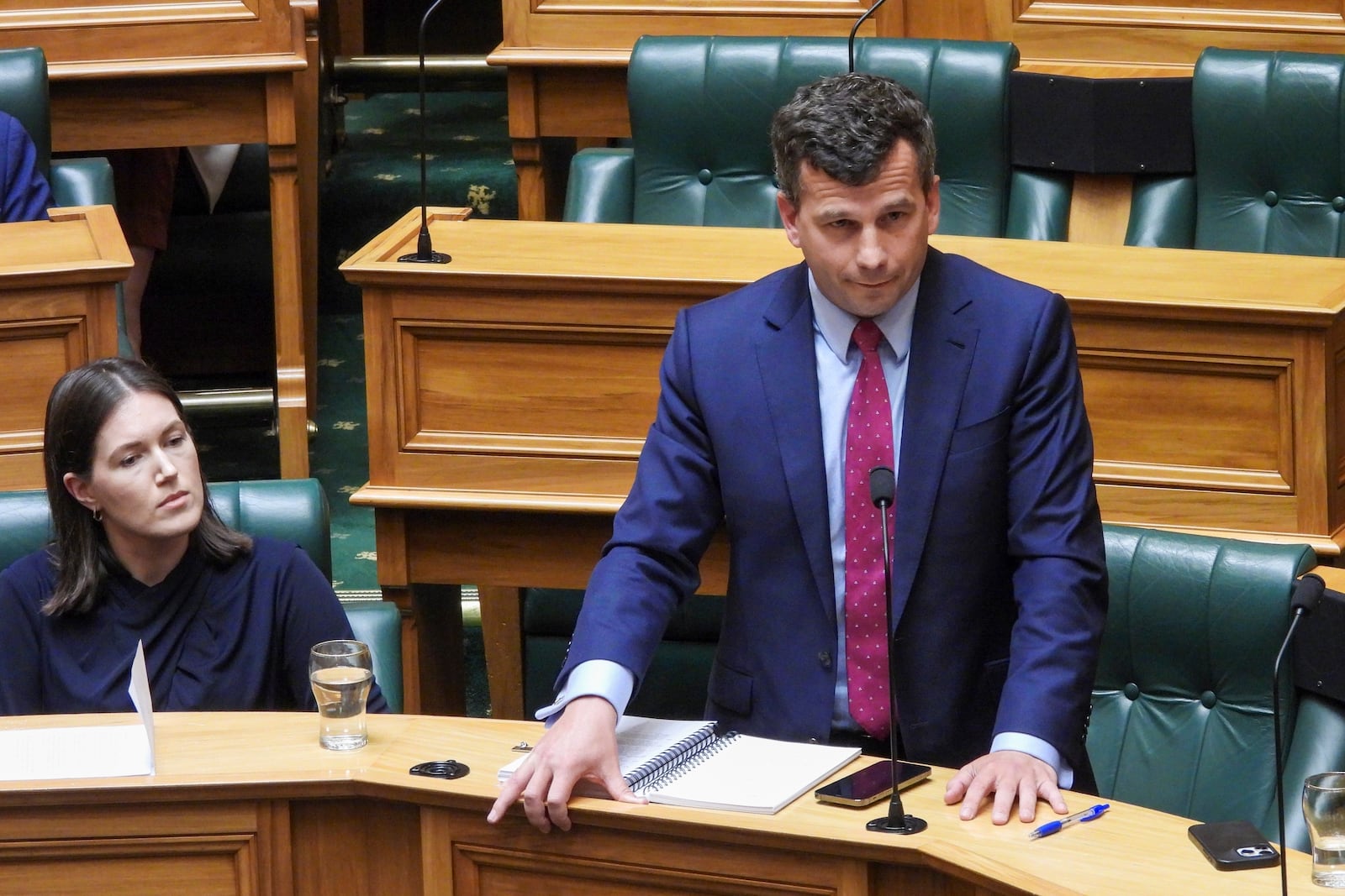 FILE - ACT Party leader David Seymour stands during the first debate on the Treaty Principles Bill in Parliament in Wellington, New Zealand, Thursday, Nov. 14, 2024. (AP Photo/Charlotte Graham-McLay, File)