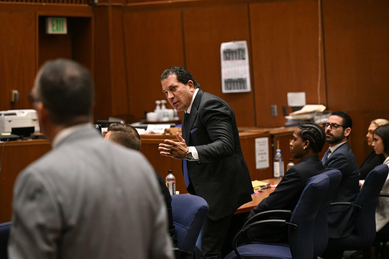 Attorney Joe Tacopina, center, speaks during the trial of his client A$AP Rocky, seated right, in Los Angeles, Friday, Feb. 14, 2025. (Patrick T. Fallon/Pool Photo via AP)