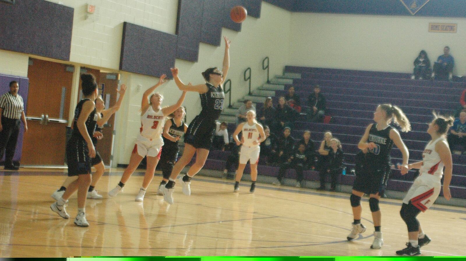 Worthington Kilbourne’s Sarah Baxter (23) goes high for a pass toward Franklin’s Kaylee Harris (3) during Sunday afternoon’s Gary West Memorial Tipoff Classic VII at Reynoldsburg. Franklin won 45-36. RICK CASSANO/STAFF