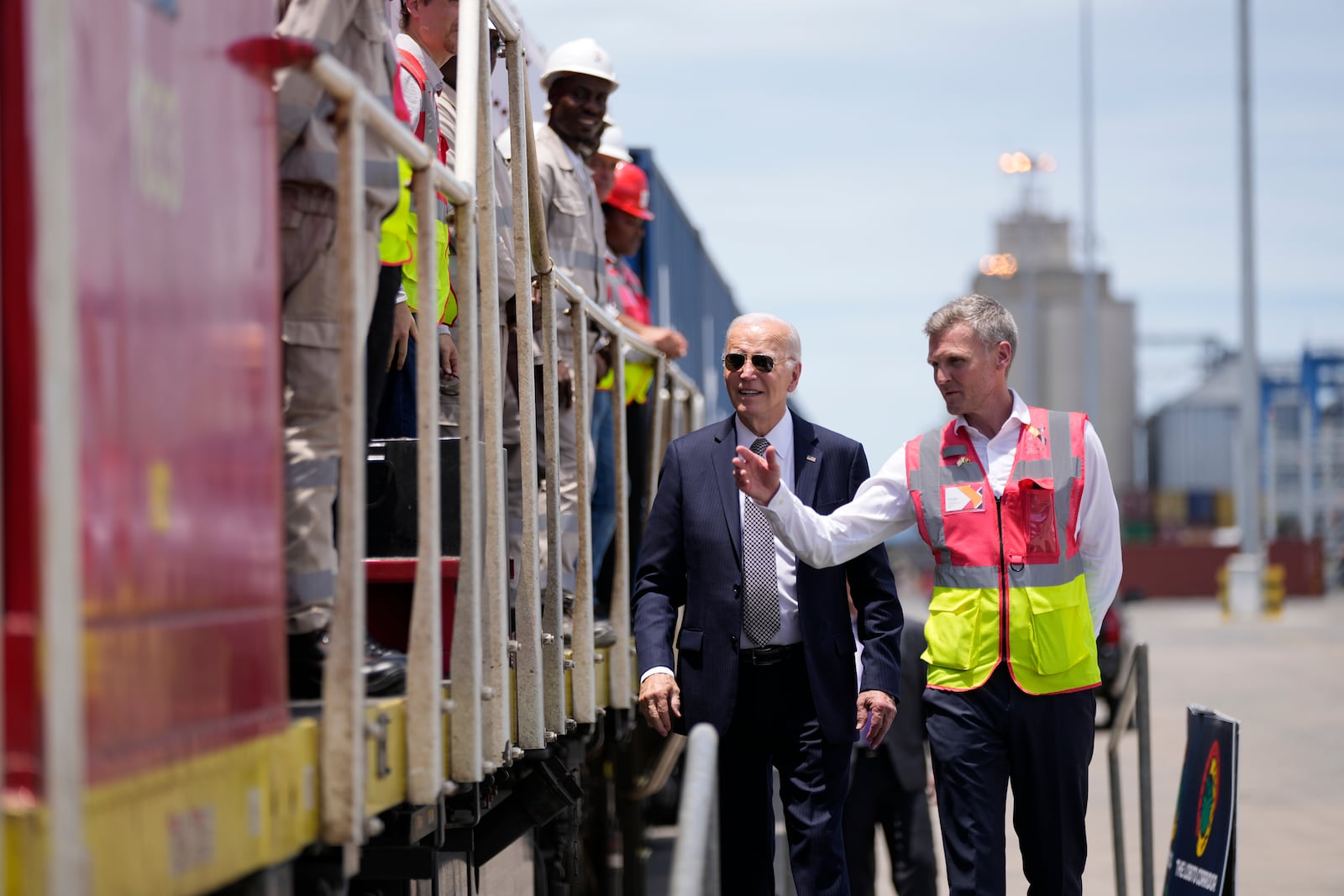 President Joe Biden and Chief Operating Officer of Lobito Atlantic Railway Nicolas Gregoire tour the Lobito Port Terminal in Lobito, Angola, on Wednesday, Dec. 4, 2024. (AP Photo/Ben Curtis)