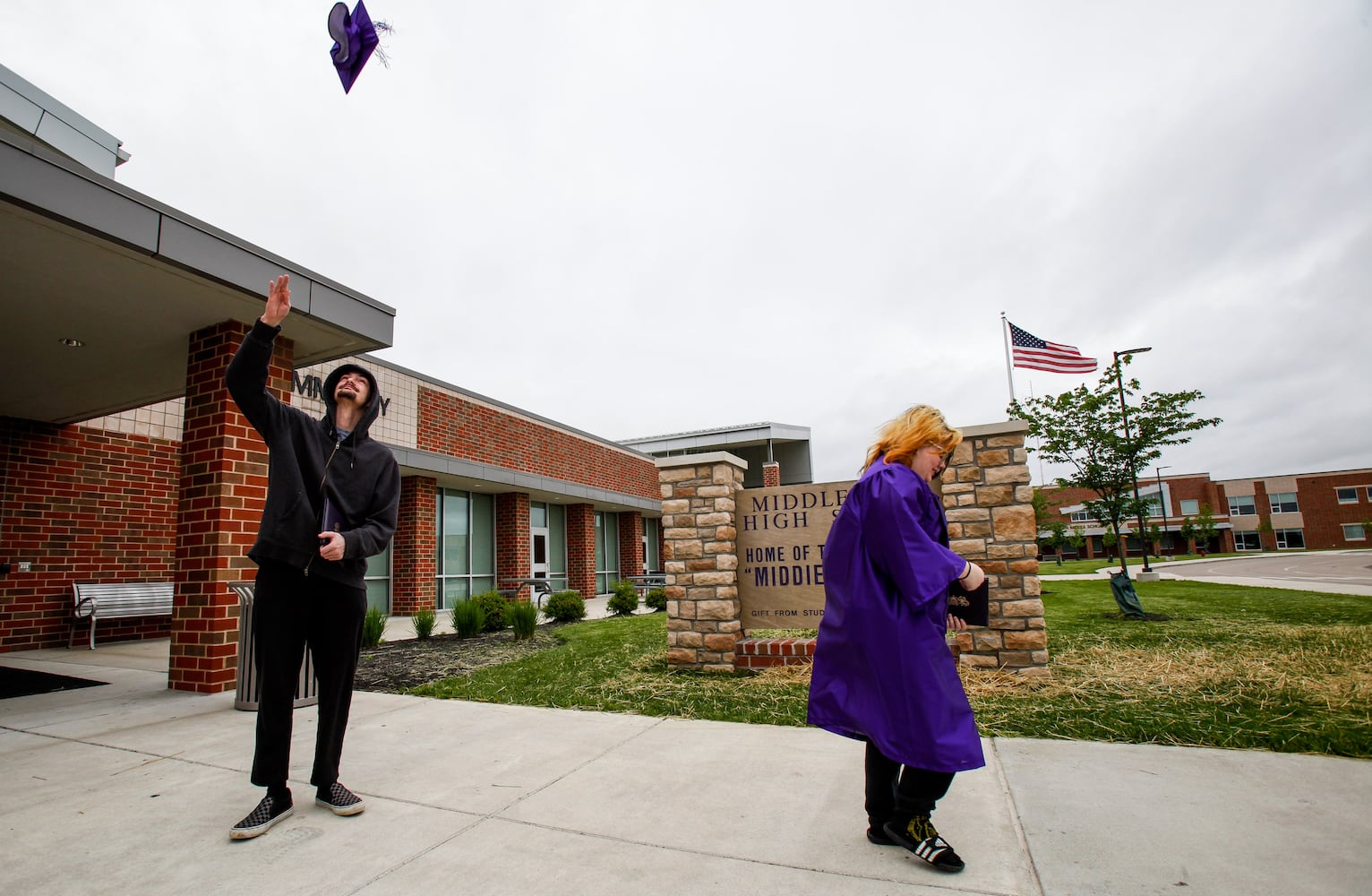 Middletown High School graduates drive up to receive diplomas