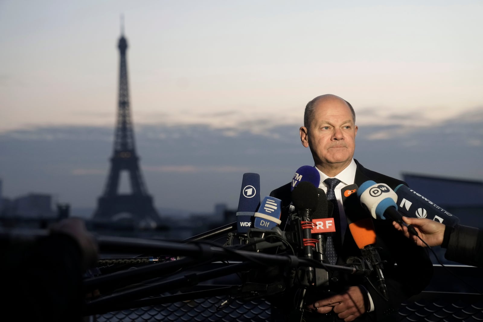 Germany's Chancellor Olaf Scholz speaks with the media at the German Embassy after an informal meeting of leaders from key European Union nations and the United Kingdom in Paris, Monday, Feb. 17, 2025. (AP Photo/Thibault Camus)