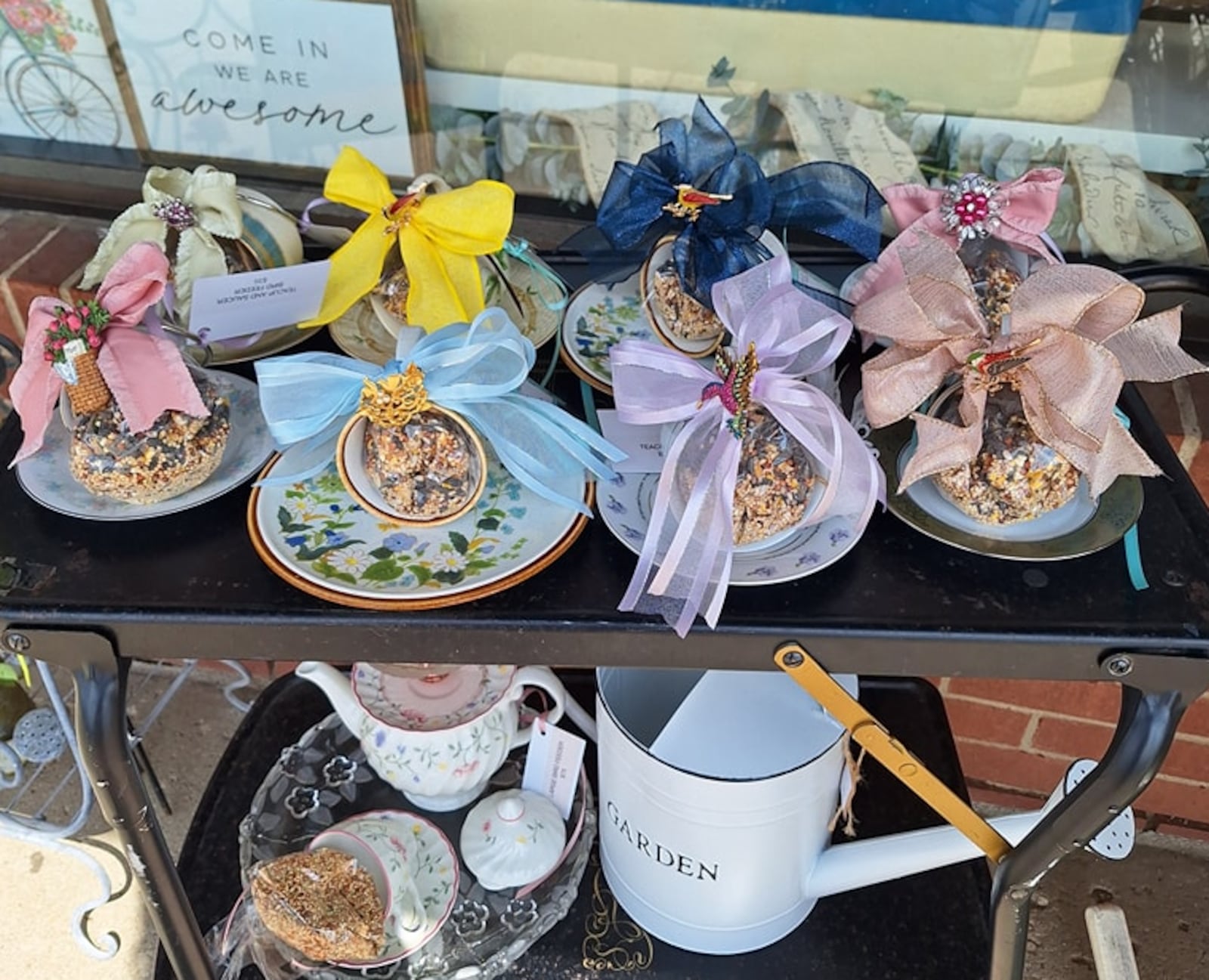 Vintage teacups turned birdfeeders handmade by Pat Schlangen are seen here. CONTRIBUTED