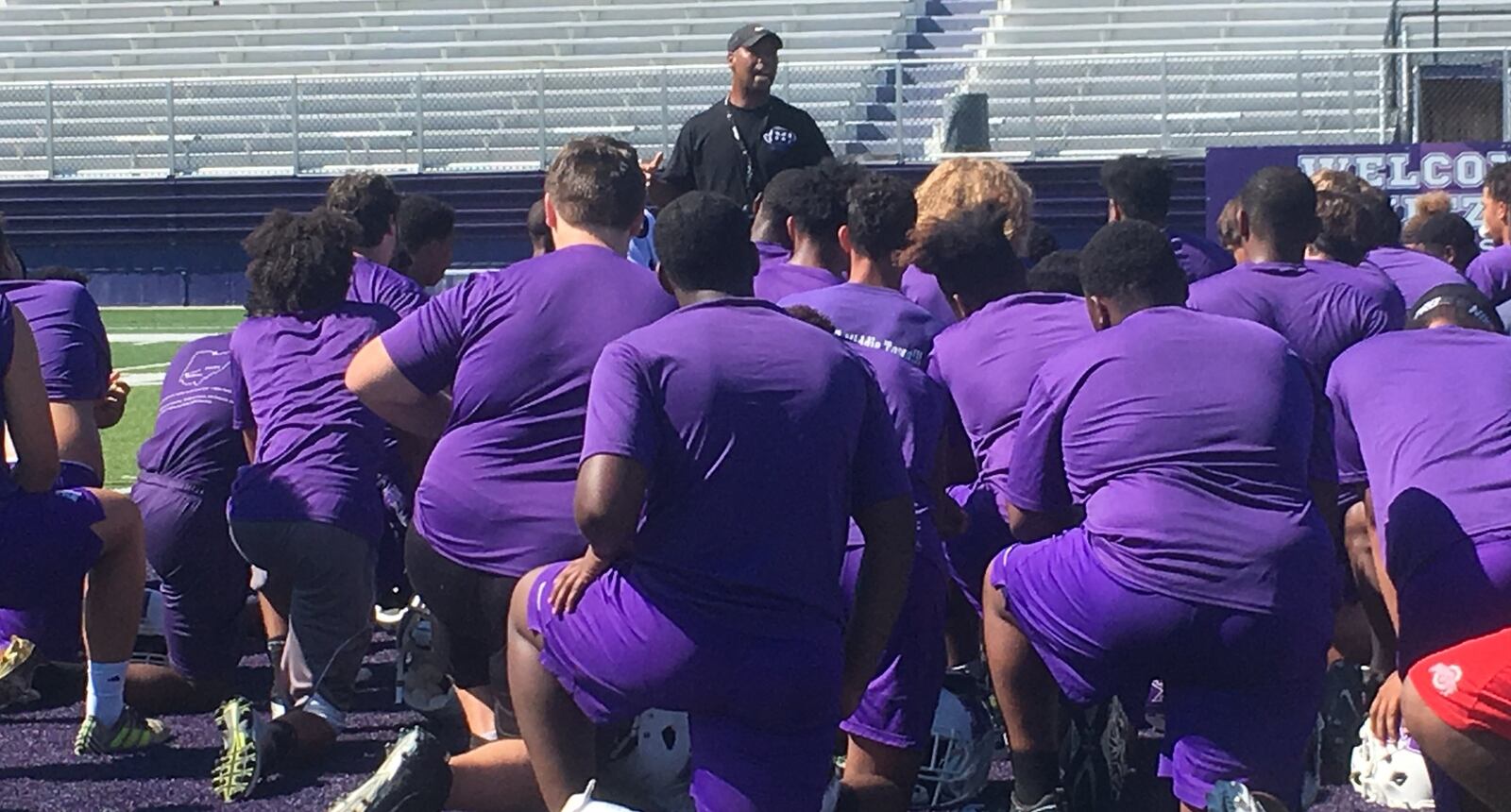 Don Simpson addresses his Middletown football team after a practice session this season at Barnitz Stadium in Middletown. RICK CASSANO/STAFF