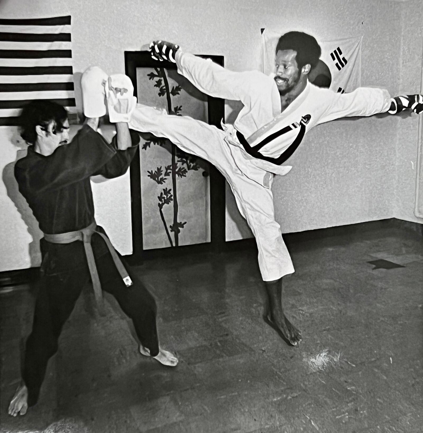 Lifelong Hamilton resident Bob “Moo Duk Kwan” Harris has been teaching karate since 1969, including more than 35 years of teaching at the Hamilton YMCA and his own studio. He has reached Supreme Nim Grand Master status in karate and and is a two-time national champion. Harris operates his photography business and Moo Duk Kwan Karate Temple at his South Second Street studio. NICK GRAHAM/STAFF  Hamilton resident Bob “Moo Duk Kwan” Harris has been teaching karate since 1969, including more than 35 years of teaching at the Hamilton YMCA and his own studio. He has reached Supreme Nim Grand Master status in karate and and is a two-time national champion. Harris operates his photography business and Moo Duk Kwan Karate Temple at his South Second Street studio. Harris is pictured, right, practicing with student Darrell Croucher over 40 years ago in a Journal-News photo by John Janco.