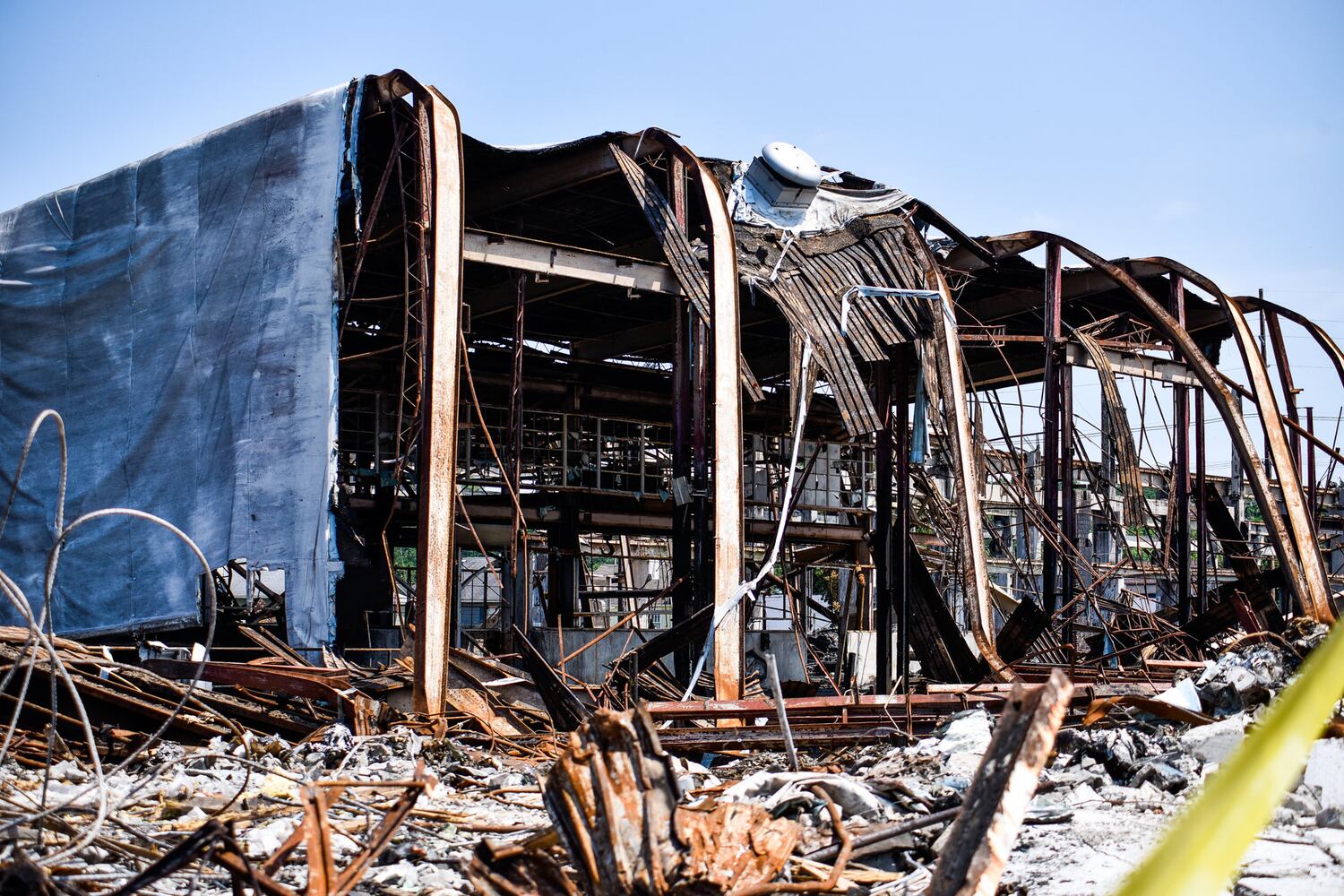 Crews demolish warehouse after massive fire in Hamilton