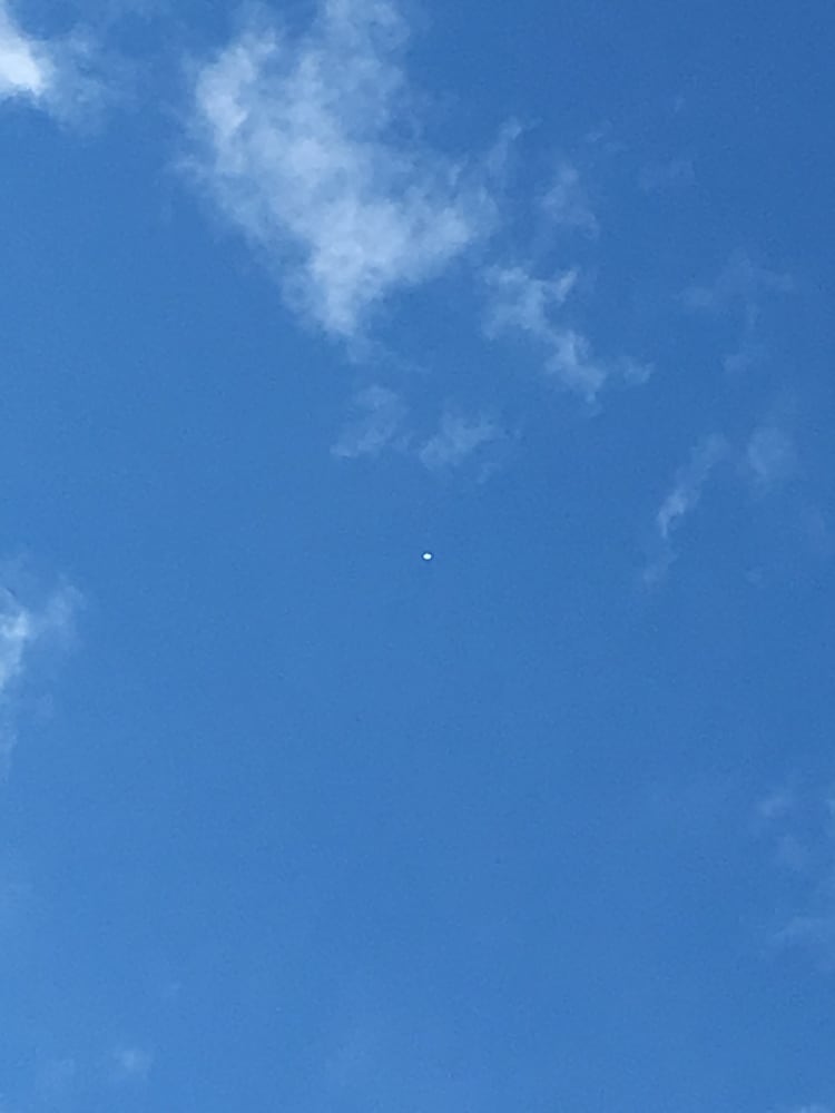 Photos of bright white dot in sky