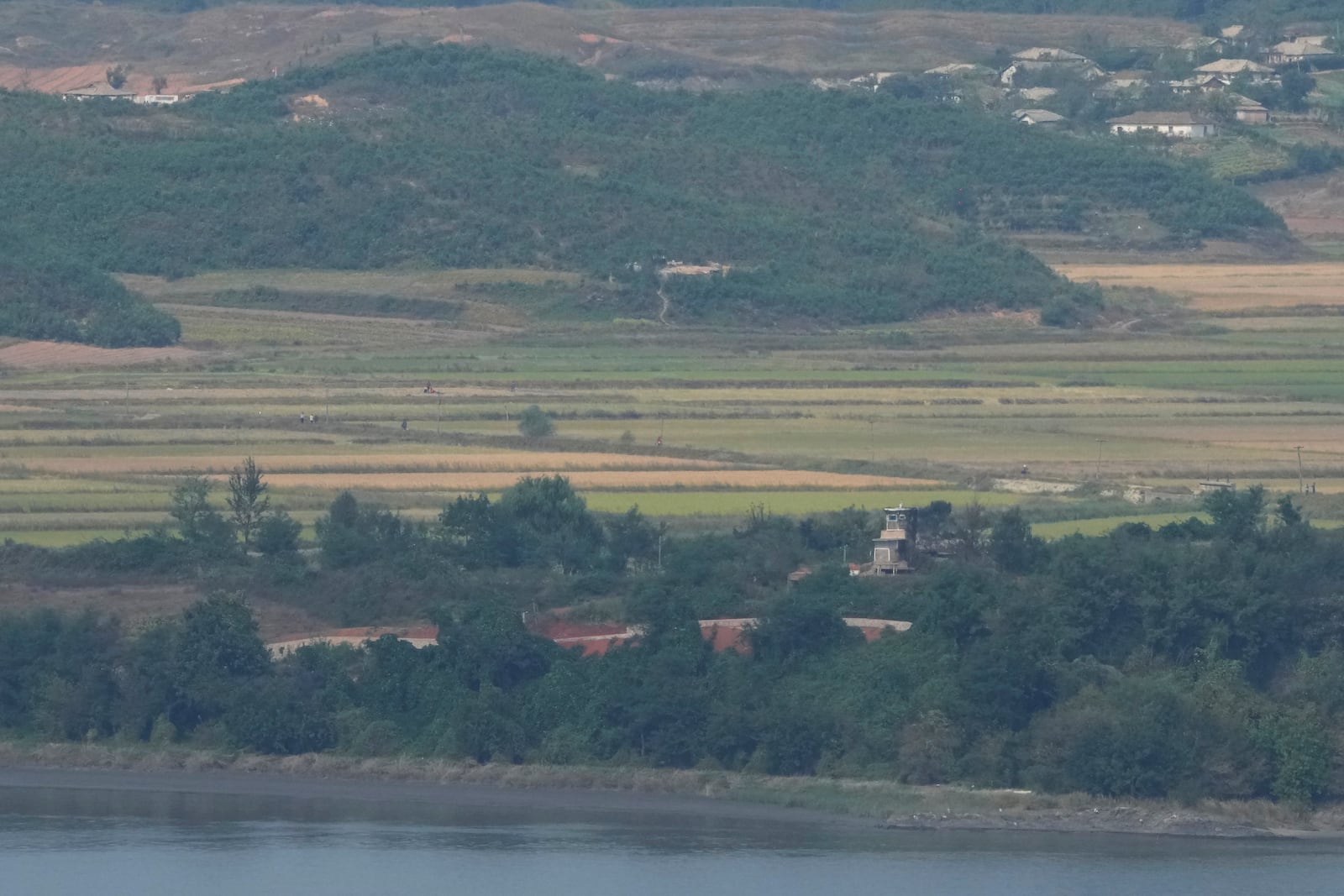 A North Korean military guard post is seen from the Unification Observation Post in Paju, South Korea, near the border with North Korea, Thursday, Oct. 10, 2024. (AP Photo/Ahn Young-joon)