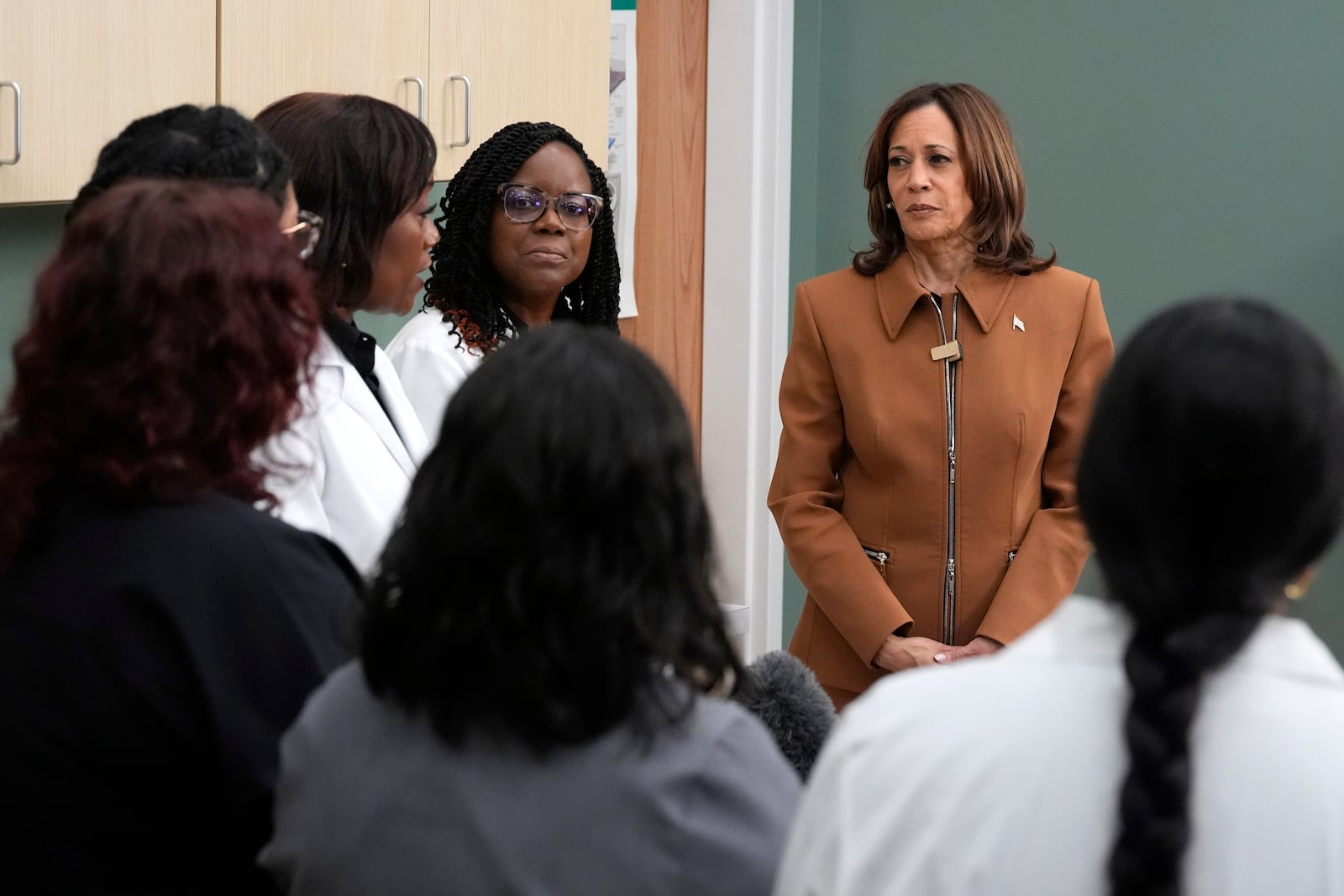 Democratic presidential nominee Vice President Kamala Harris listens during a discussion about reproductive care with healthcare providers and medical students in Portage, Mich., Saturday, Oct. 26, 2024. (AP Photo/Jacquelyn Martin)