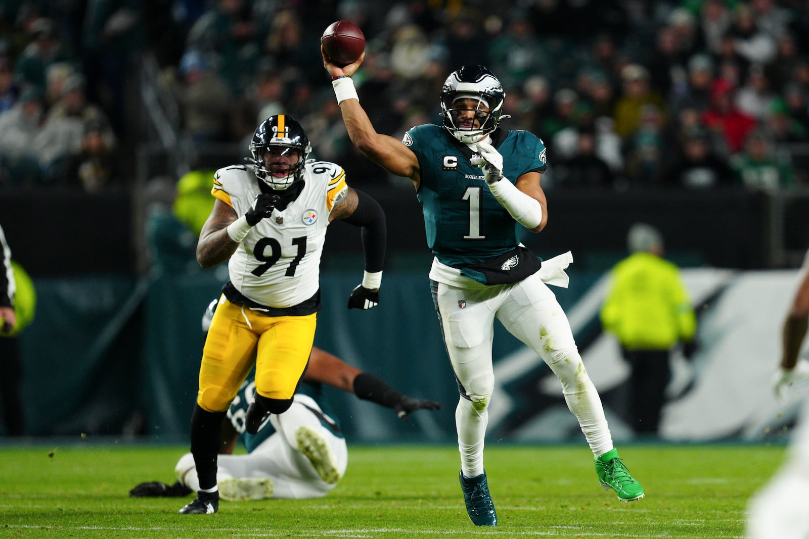 Philadelphia Eagles quarterback Jalen Hurts (1) throws the ball during the second half of an NFL football game against the Pittsburgh Steelers on Sunday, Dec. 15, 2024, in Philadelphia. (AP Photo/Derik Hamilton)