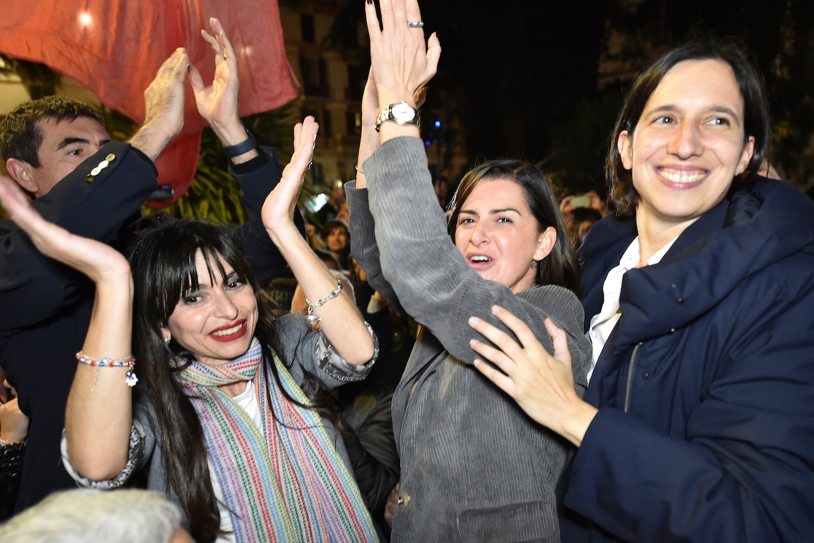 Center-left candidate Stefania Proietti, left, celebrates with Democratic Party leader Elly Schlein, right, following regional elections in the region of Umbria, in Perugia, Italy, late Monday, Nov. 18, 2024. (Roberto Settonce/LaPresse via AP)