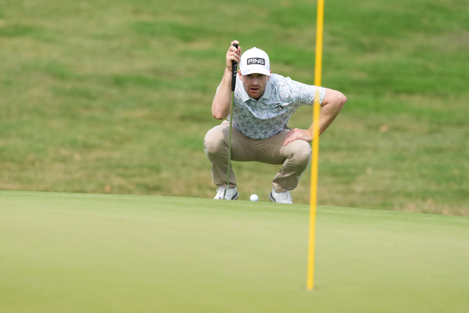 Brian Campbell, of the United States, studies his putt on the green of the 13th hole during the third round of the Mexico Open golf tournament in Puerto Vallarta, Mexico, Saturday, Feb. 22, 2025. (AP Photo/Fernando Llano)