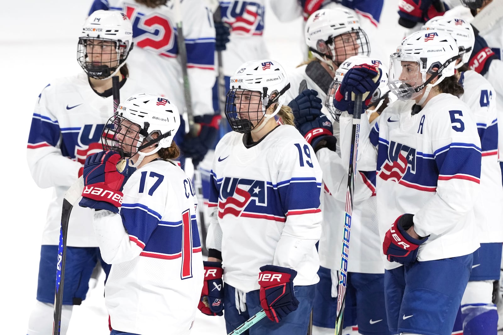 Members of Team USA react following their 3-1 loss to Team Canada in the final game of Rivalry Series hockey action in Summerside, Canada, on Saturday, Feb. 8, 2025. (Darren Calabrese/The Canadian Press via AP)