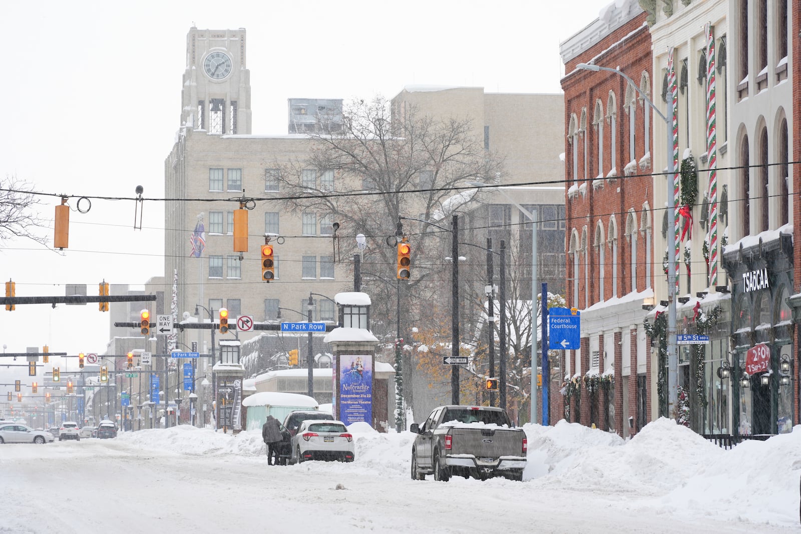 State Street, one of the main streets in downtown Erie, Pa., is covered in snow Tuesday, Nov. 5, 2024. (AP Photo/Gene J. Puskar)