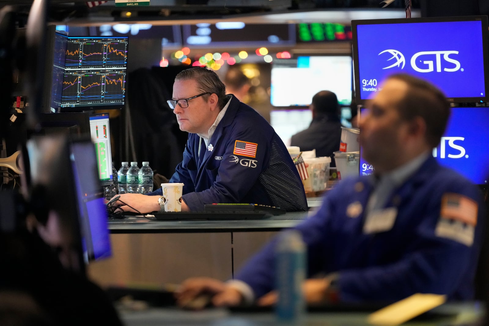 Traders work on the floor at the New York Stock Exchange in New York's Financial District Thursday, Jan. 2, 2025. (AP Photo/Seth Wenig)