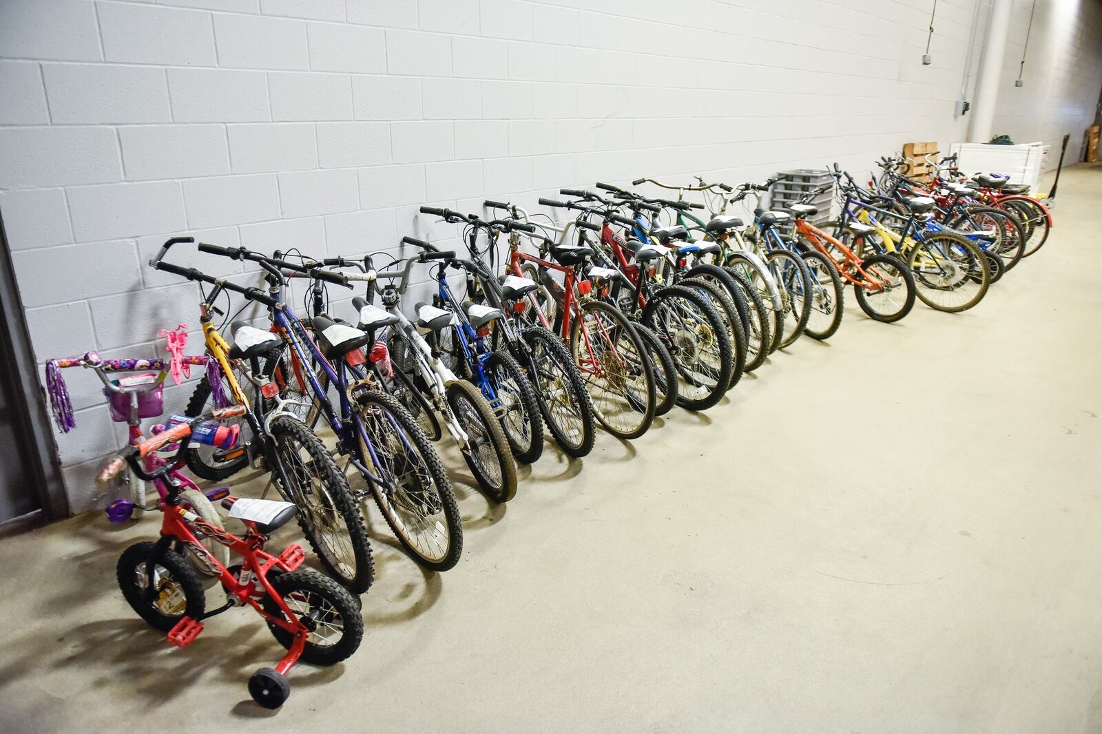 Some of the unclaimed lost bicycles that are stored in the West Chester Police department evidence room. The items will soon be listed on an auction site for sale. 