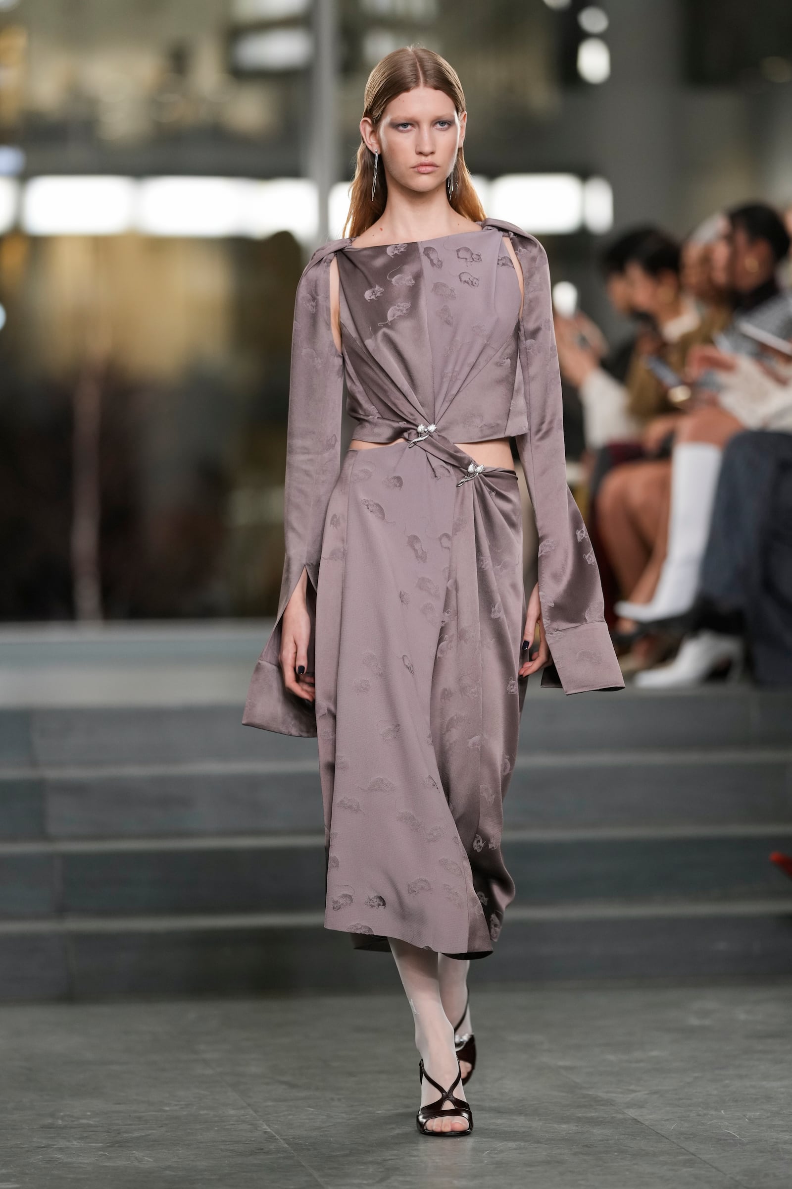 A model walks the runway during the Tory Burch Fall/Winter 2025 fashion show as part of New York Fashion Week on Monday, Feb. 10, 2025, at the Museum of Modern Art in New York. (Photo by Charles Sykes/Invision/AP)