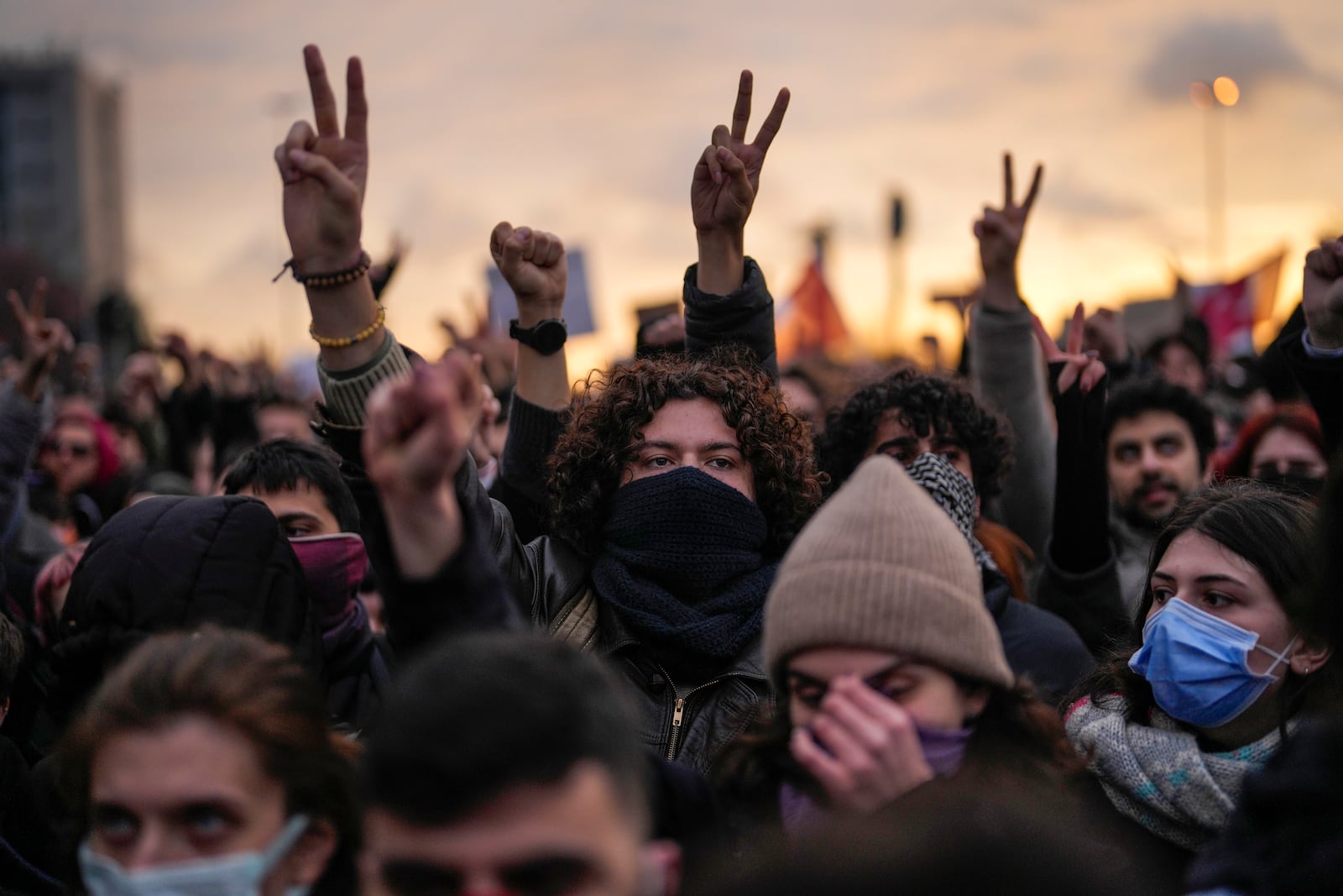 People shout slogans as they march to protest against the arrest of Istanbul Mayor Ekrem Imamoglu, in Istanbul, Turkey, Thursday, March 20, 2025. (AP Photo/Khalil Hamra)