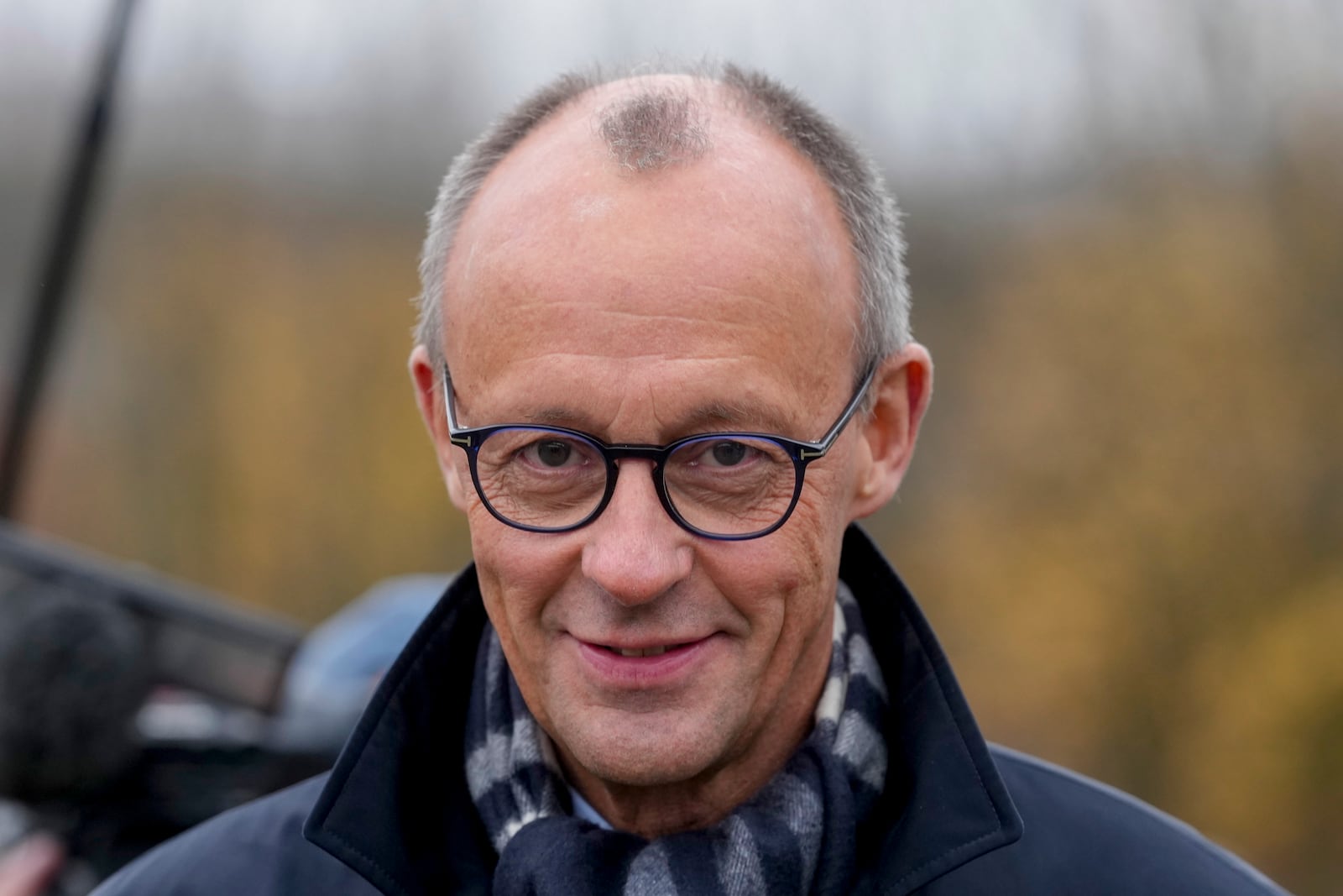 FILE - CDU party leader Friedrich Merz arrives for a meeting with German Chancellor Olaf Scholz at the chancellery in Berlin, Nov. 7, 2024. (AP Photo/Markus Schreiber, File)