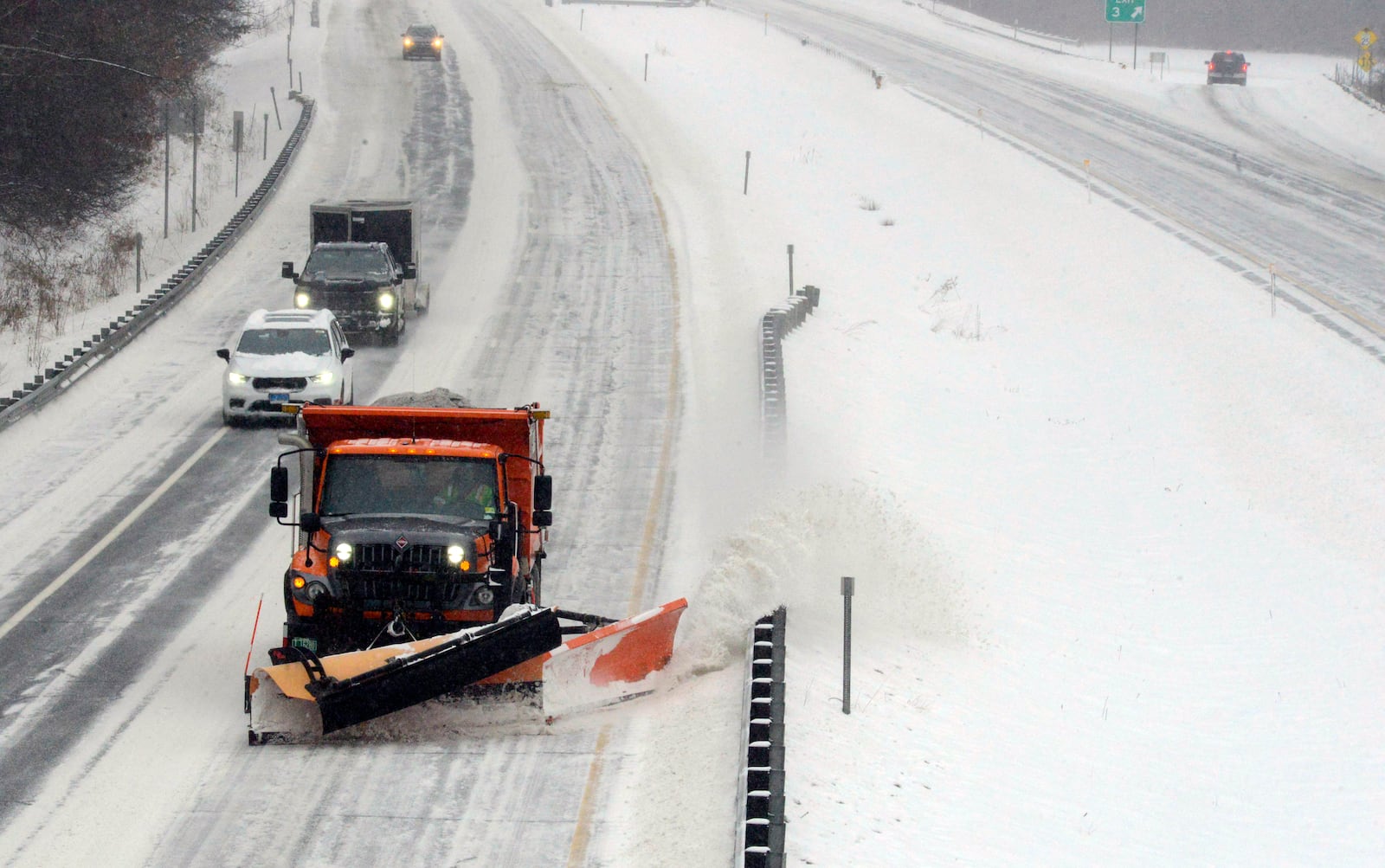 Dale West, a maintenance technician for the Vermont Agency of Transportation, Division 2 in Dummerston, Vt., plows the left lane of I-91 from Exit 3 to the Massachusetts state line during a snowstorm Thursday, Feb. 6, 2025. (Kristopher Radder/The Brattleboro Reformer via AP)