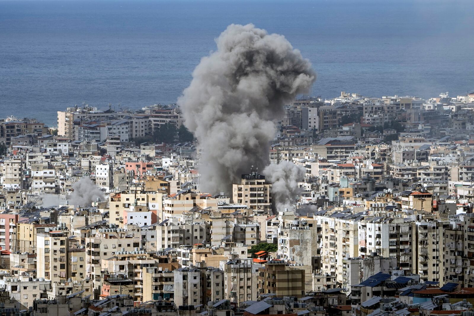 Smoke rises after an Israeli airstrike on Dahiyeh, in the southern suburb of Beirut, Lebanon, Monday, Nov. 25, 2024. (AP Photo/Bilal Hussein)