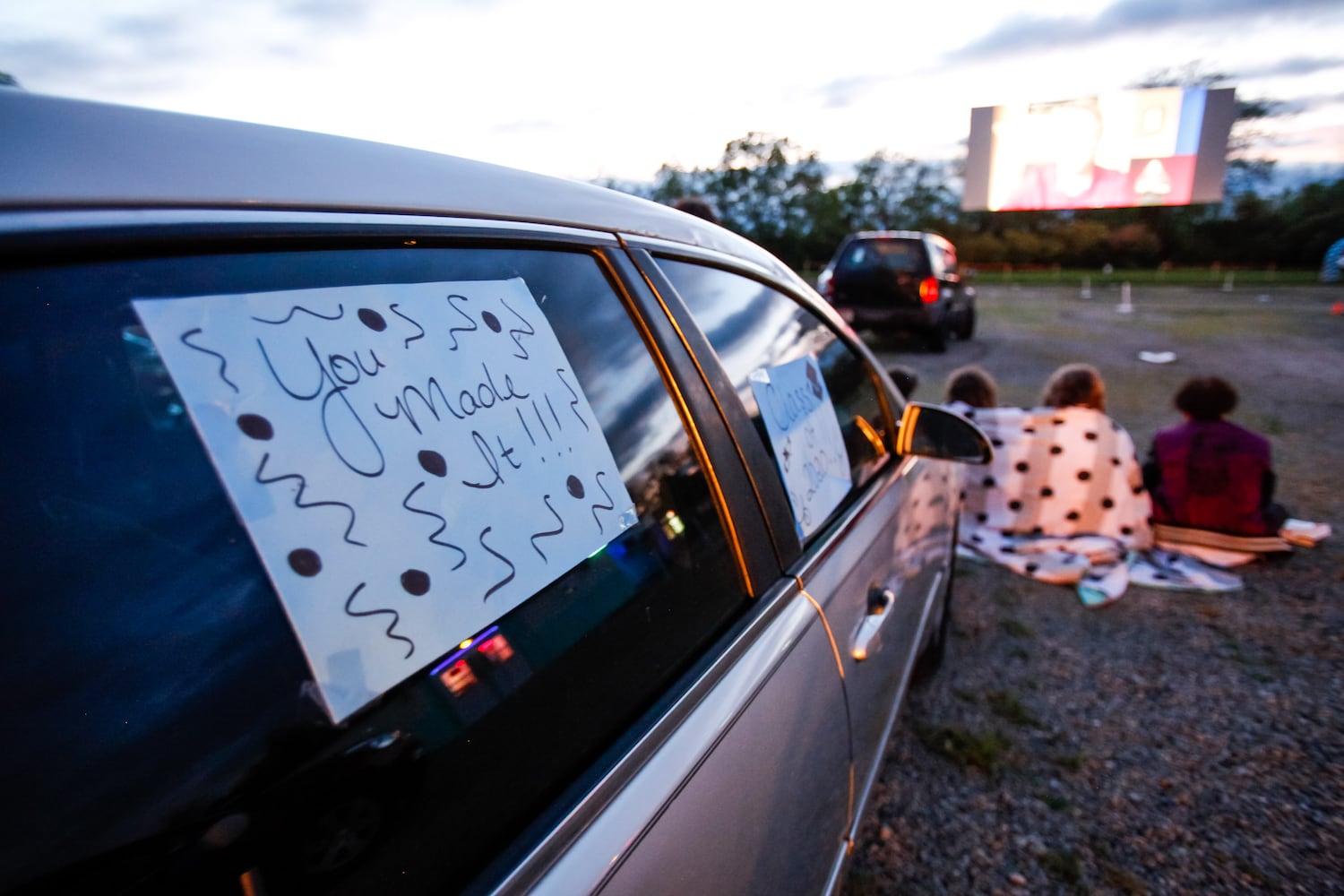 Hamilton High School seniors celebrate graduation at Holiday Auto Theatre drive-in