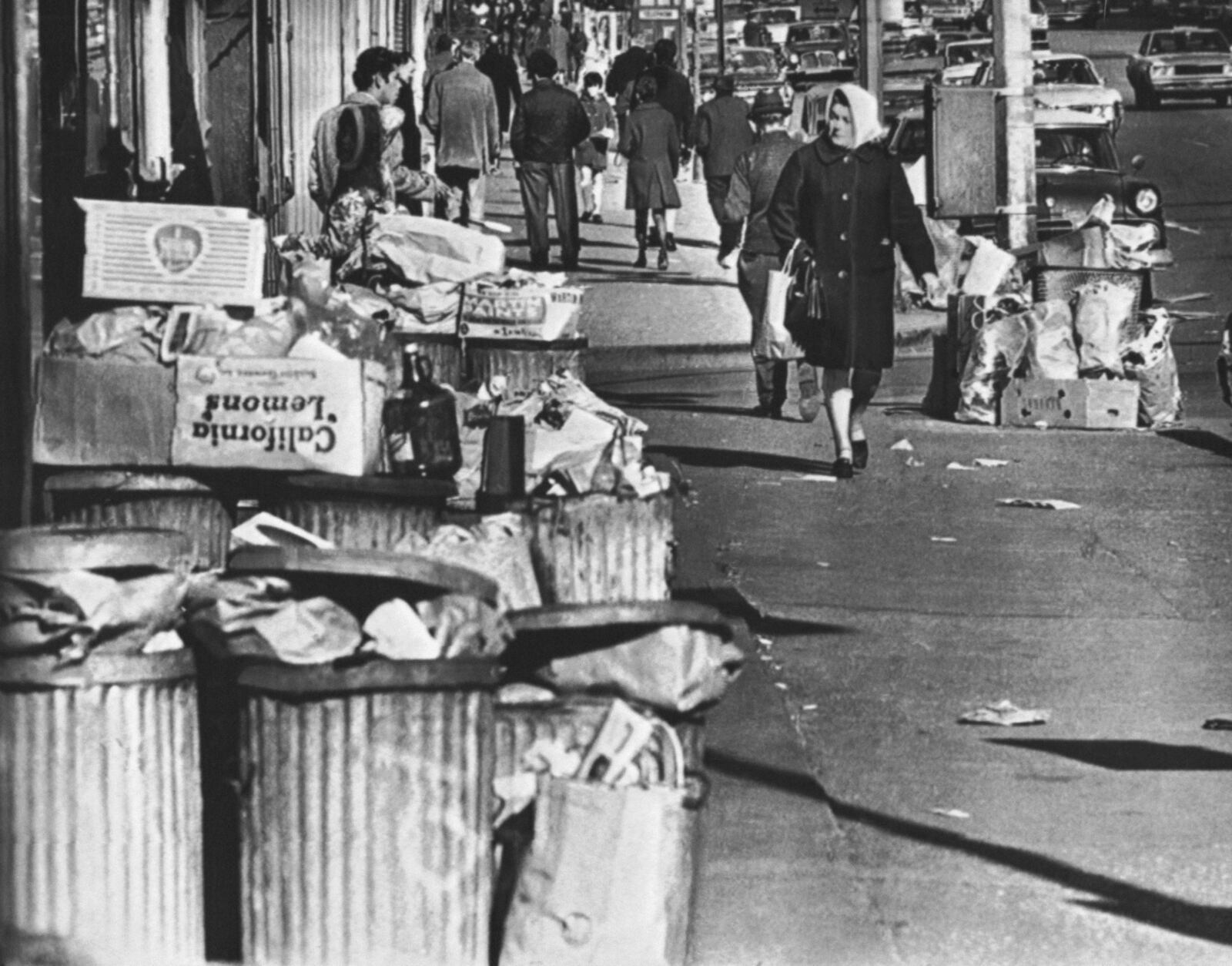 FILE - Rubbish is seen piled up in a New York City street on the third day of a strike by sanitation workers. Feb. 6, 1968. (AP Photo)