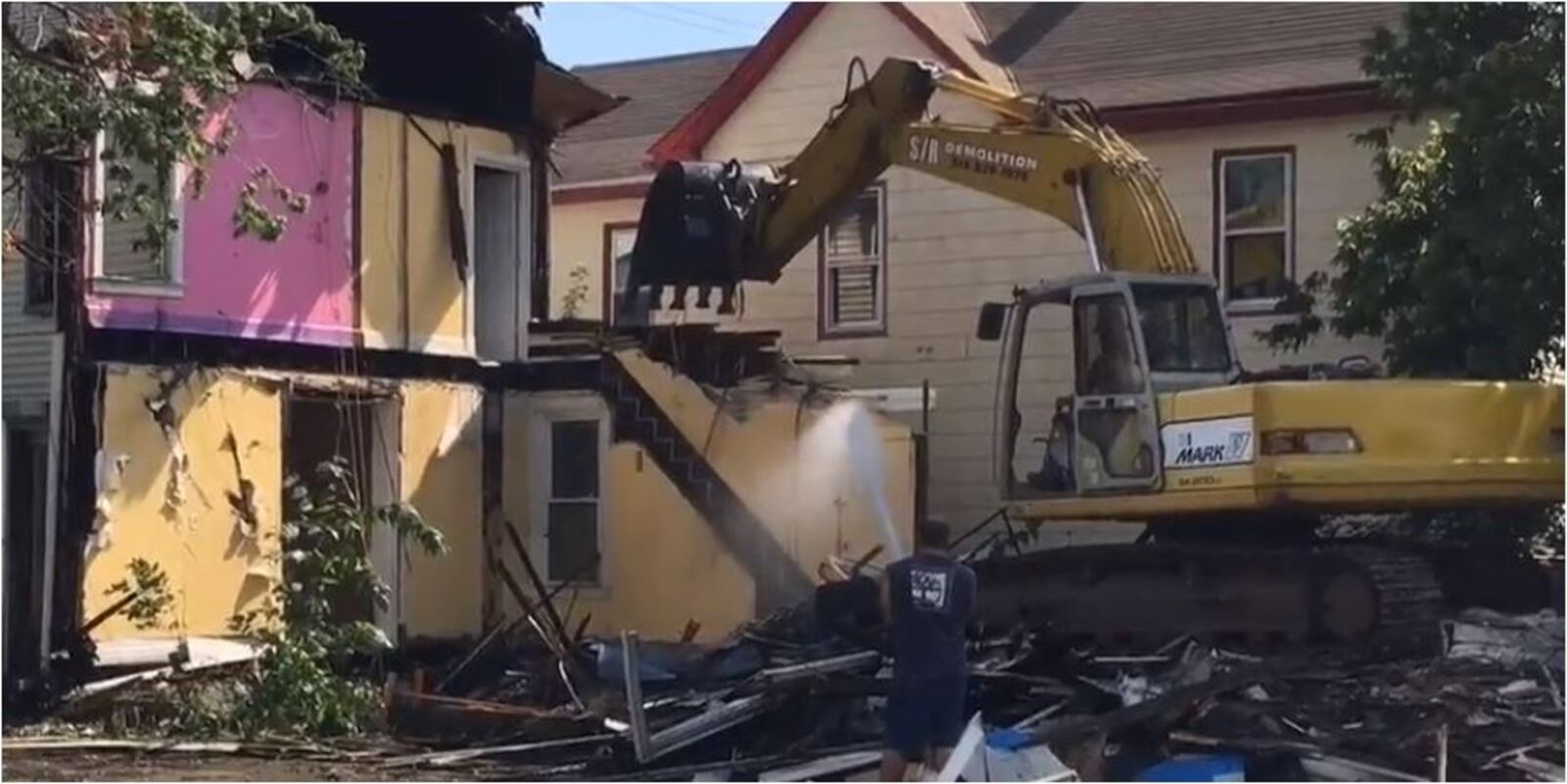 A house was demolished in Hamilton during 2016, one of many that year. MIKE RUTLEDGE/STAFF