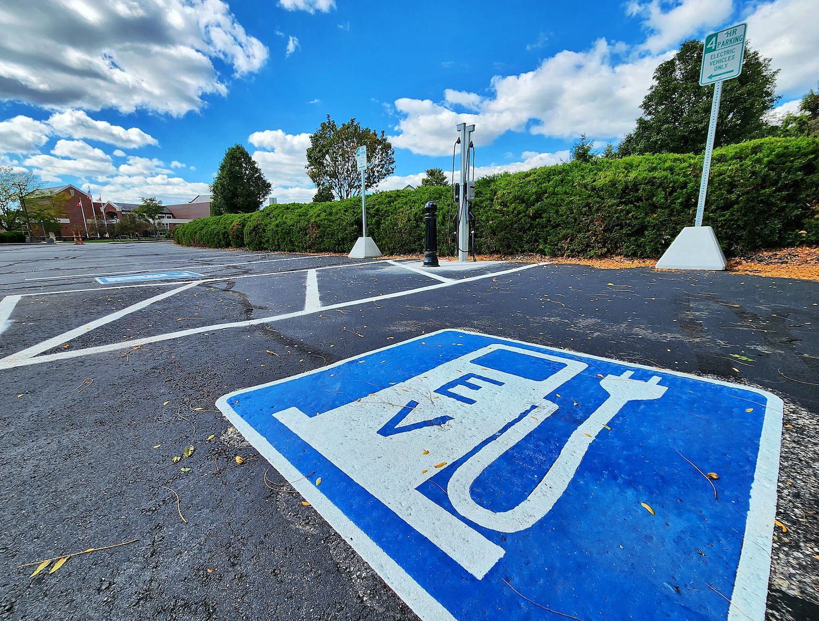 Fairfield is looking to develop a comprehensive sustainability plan for the city. The city has incorporated elements of sustainability around the city, including the electric vehicle charging station at the Community Arts Center on Wessell Drive, pictured, a pair of projects at Huffman Park, 2100 Gray Road, which include a wind turbine used to power pond aeration system and the park's community garden. NICK GRAHAM/STAFF