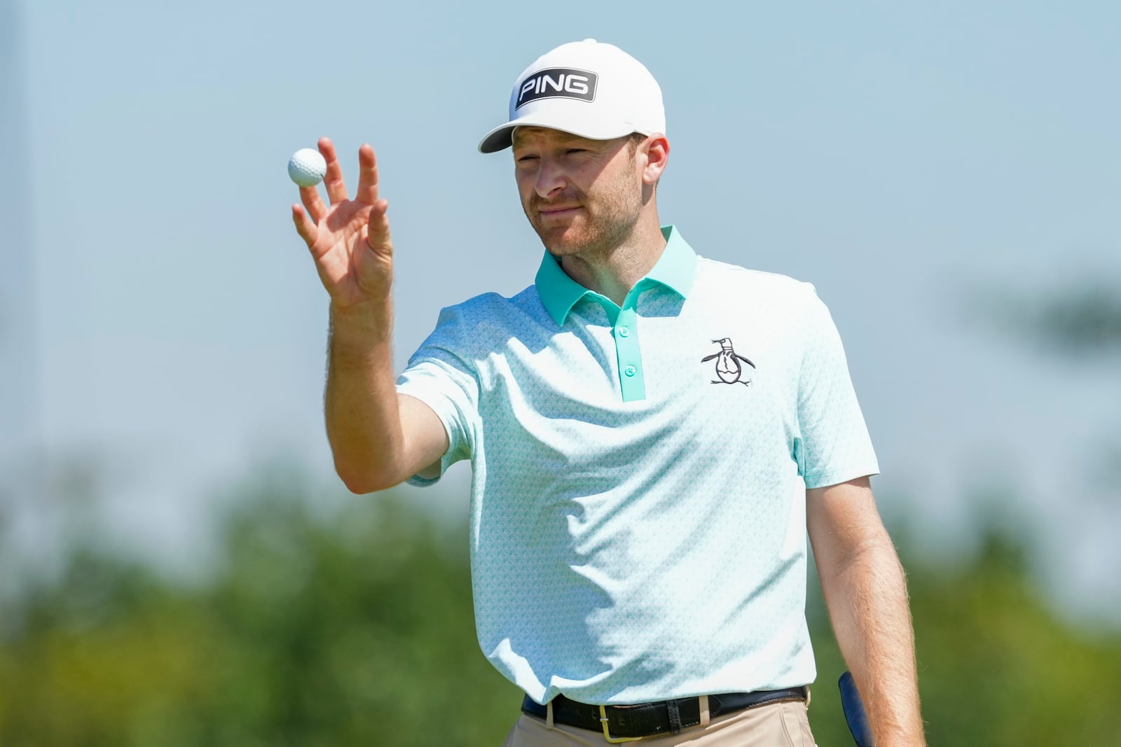 Brian Campbell, of the United States, catches a ball during the final round of the Mexico Open golf tournament in Puerto Vallarta, Mexico, Sunday, Feb. 23, 2025. (AP Photo/Fernando Llano)