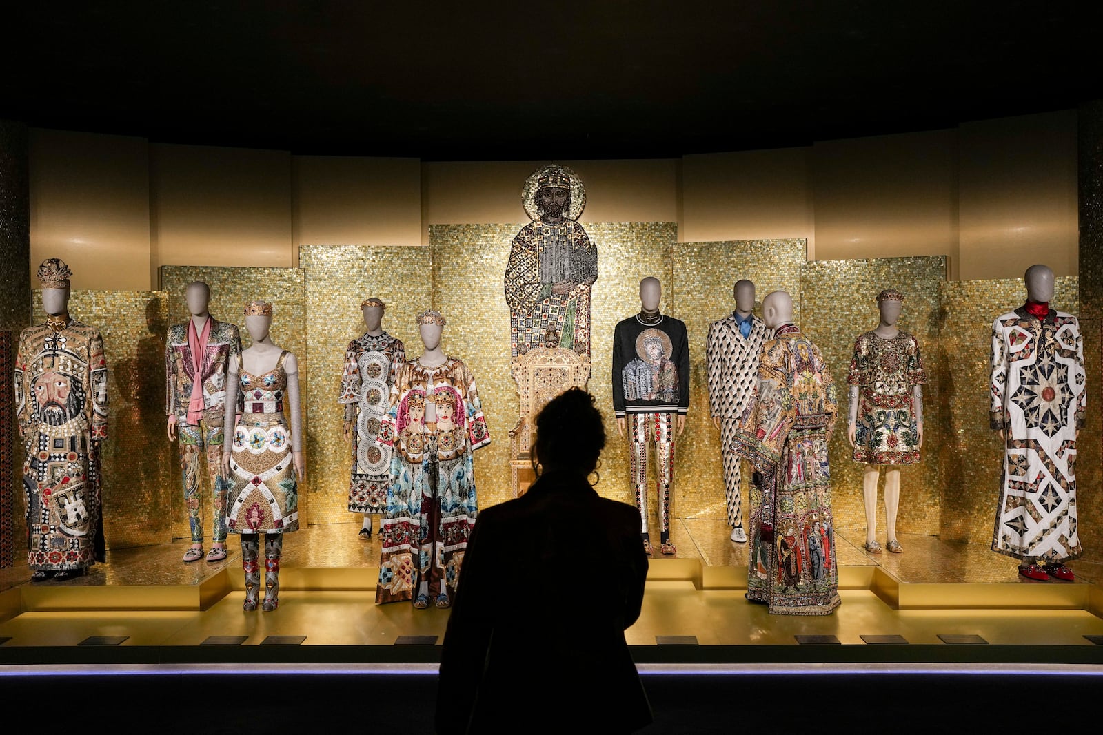 Creations are displayed during the exhibition "From the Heart to the Hands: Dolce&Gabbana" at the Grand Palais, in Paris, Thursday, Jan. 9, 2025. (AP Photo/Thibault Camus)