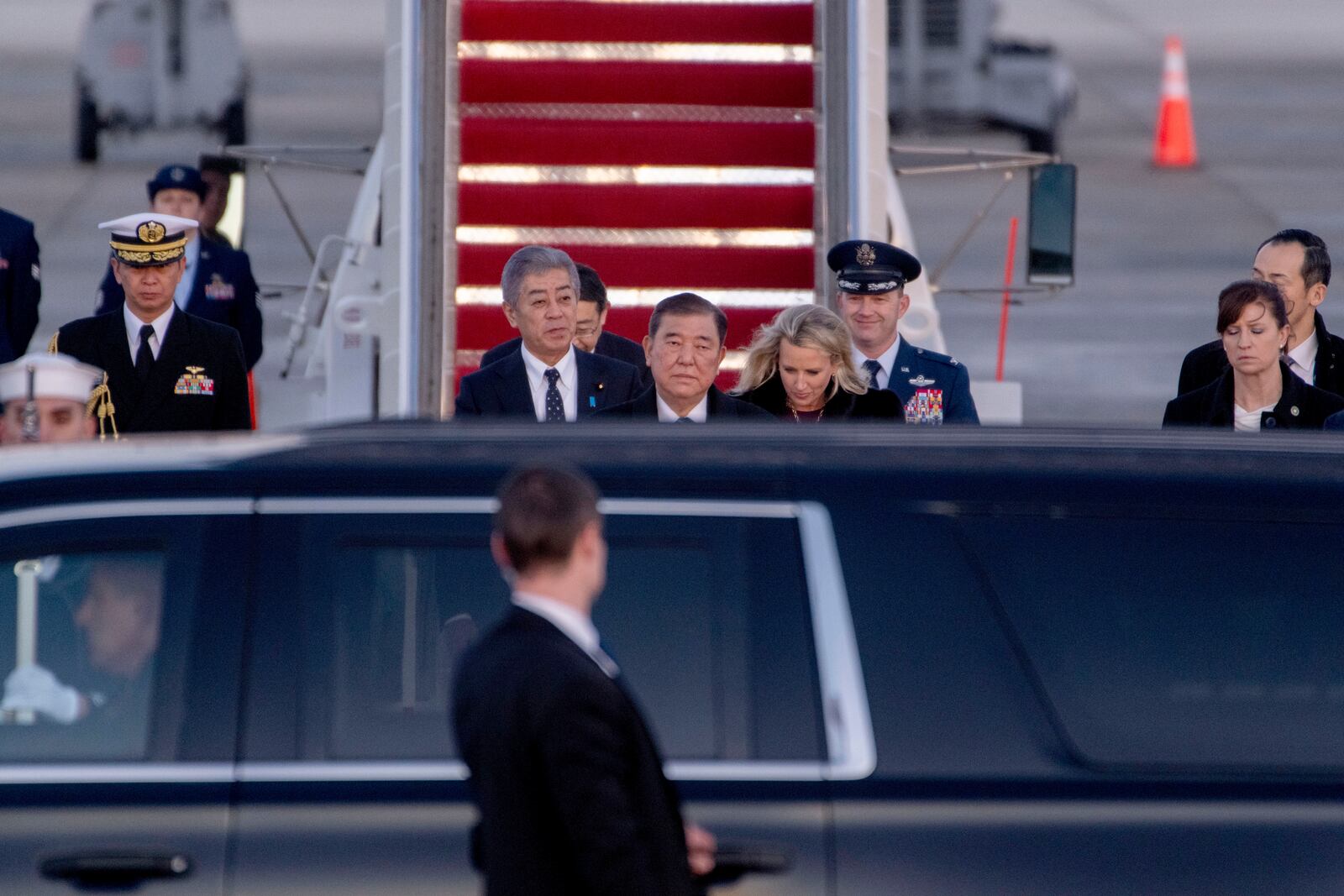 Japan's Prime Minister Shigeru Ishiba arrives at Joint Base Andrews, Md., Thursday, Feb. 6, 2025. (AP Photo/Kevin Wolf)