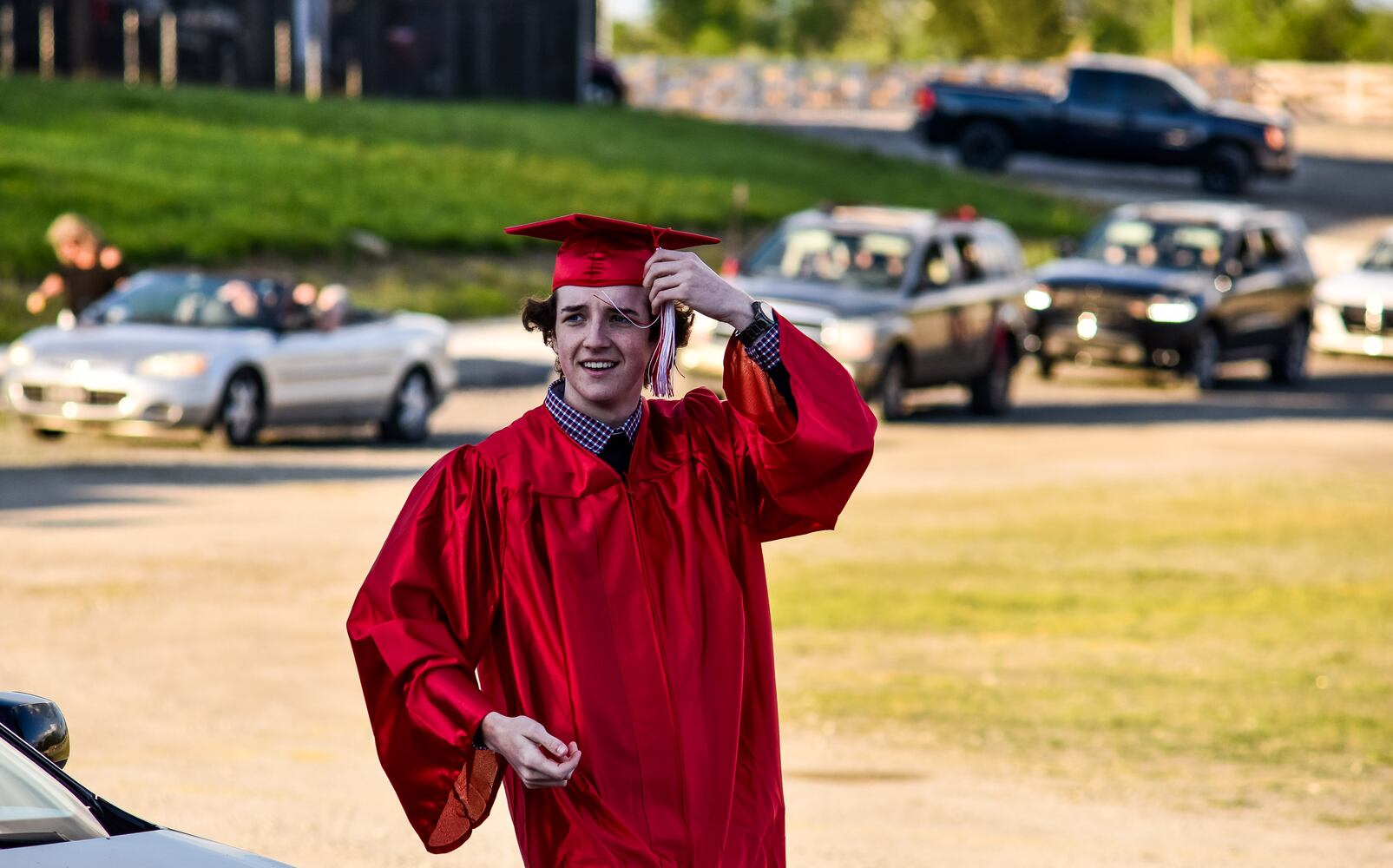 Madison High School drive-thru graduation ceremony at Land of Illusion