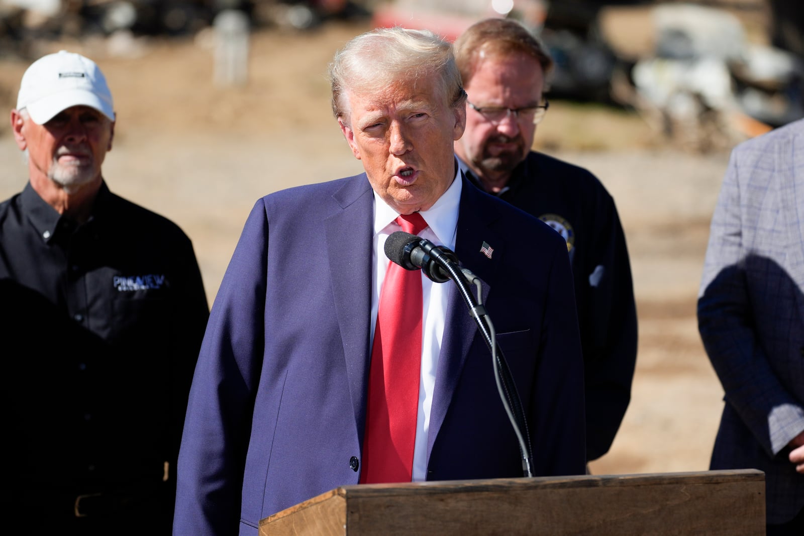 Republican presidential nominee former President Donald Trump delivers remarks on the damage and federal response to Hurricane Helene, Monday, Oct. 21, 2024, in Swannanoa, N.C. (AP Photo/Evan Vucci)