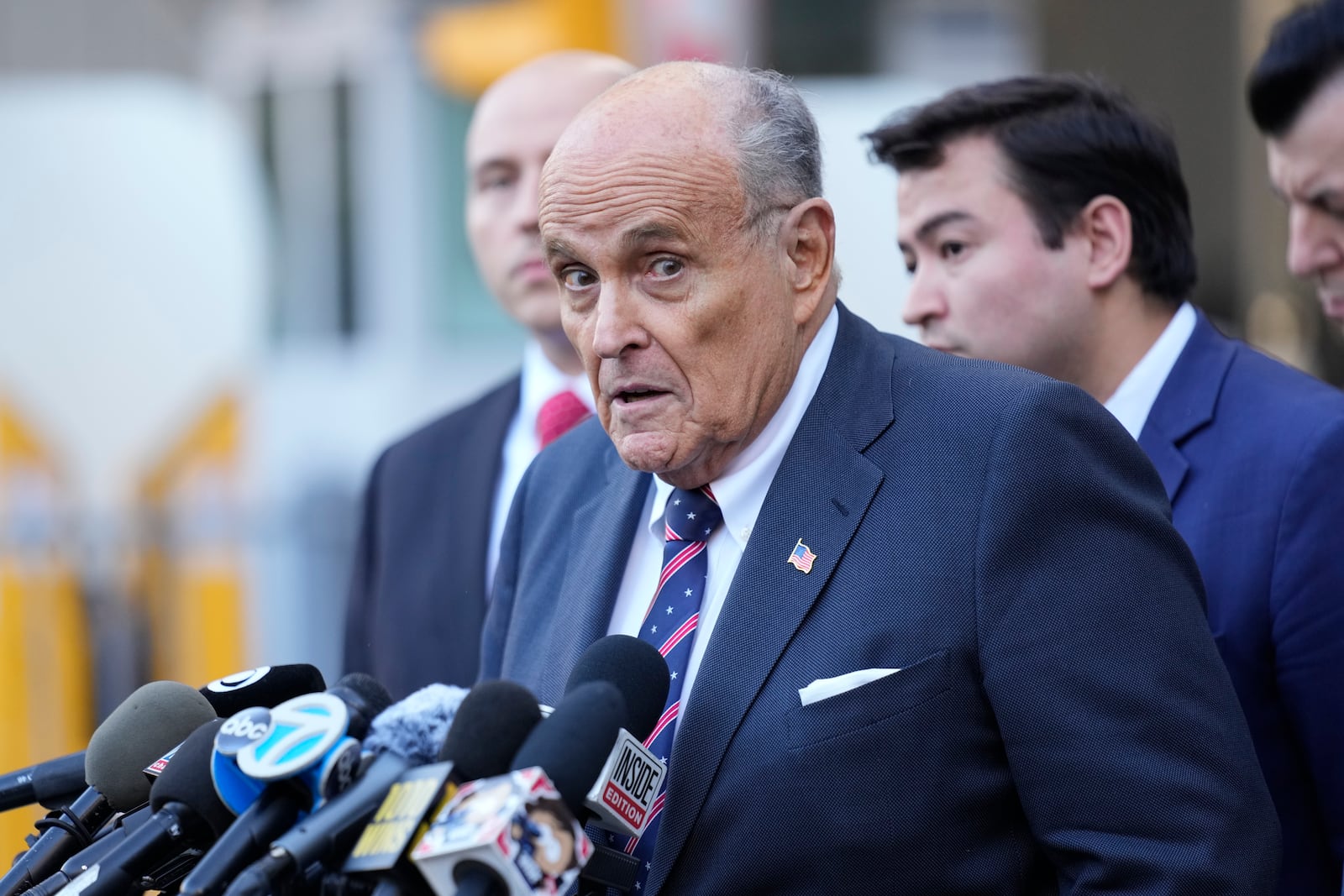 Former New York Mayor Rudy Giuliani speaks to the media as he leaves court in New York, Thursday, Nov. 7, 2024. (AP Photo/Seth Wenig)