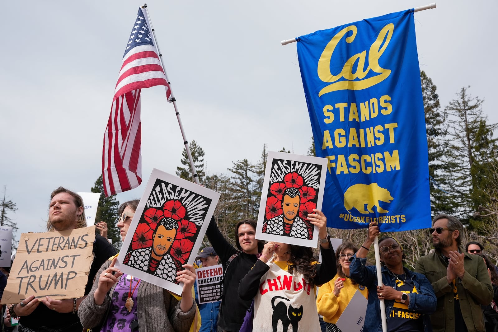 People rally at the University of California, Berkeley campus to protest the Trump administration Wednesday, March 19, 2025, in Berkeley, Calif. (AP Photo/Godofredo A. Vásquez)