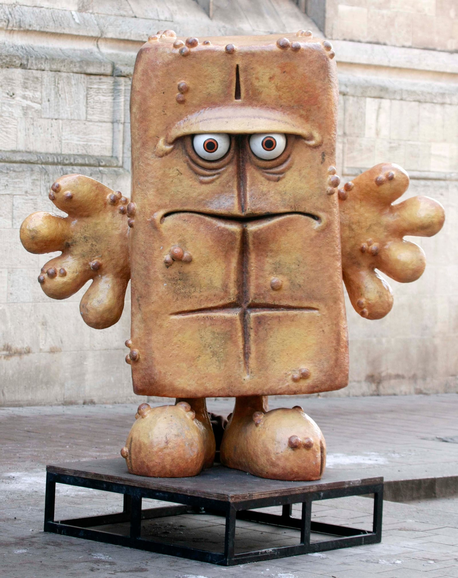 FILE - The statue "Bernd das Brot" stand in front of the City hall in Erfurt, Germany, on Wednesday, Feb. 4, 2009. (AP Photo/Jens Meyer, File)