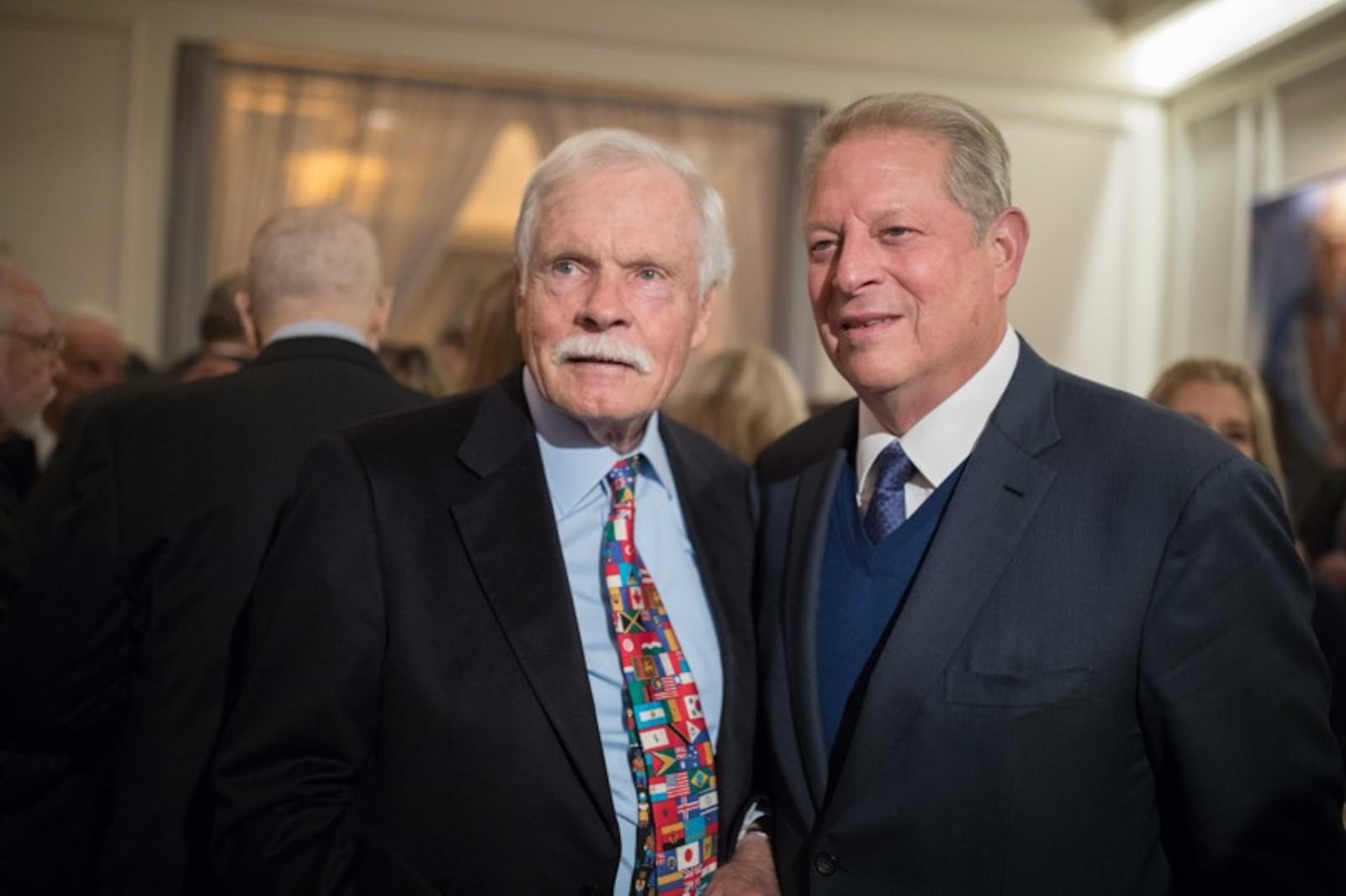 Ted Turner poses for a photo with former Vice President Al Gore during Turner's 80th birthday party at the St. Regis Atlanta hotel on Saturday, Nov. 17, 2018, in Atlanta. Turner, who recently announced he has Lewy body dementia, turns 80 on Monday