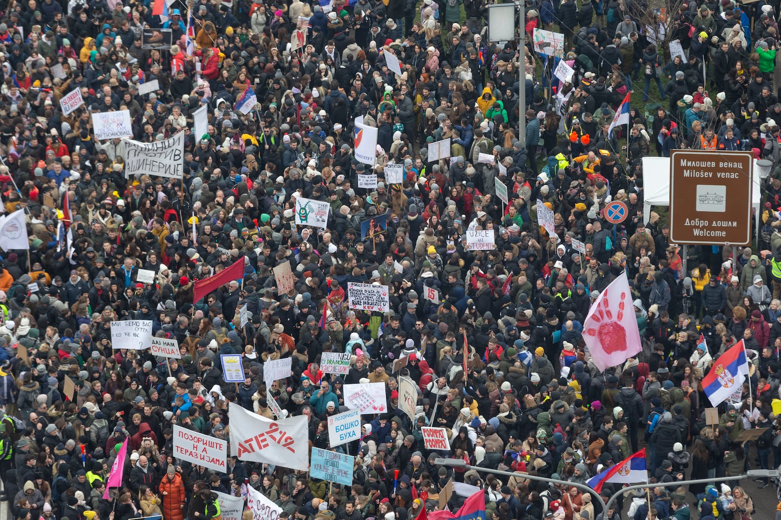 People attend a protest triggered after a concrete canopy on a railway station in the northern city of Novi Sad collapsed on Nov. 1, 2024 killed 15 people, in Kragujevac, Serbia, Saturday, Feb. 15, 2025. (AP Photo/Marko Drobnjakovic)